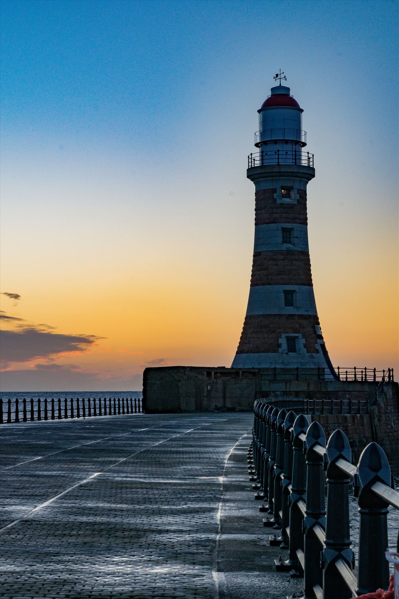 Roker Sunrise Lighthouse, at first light Roker at sunrise by AJ Stoves Photography