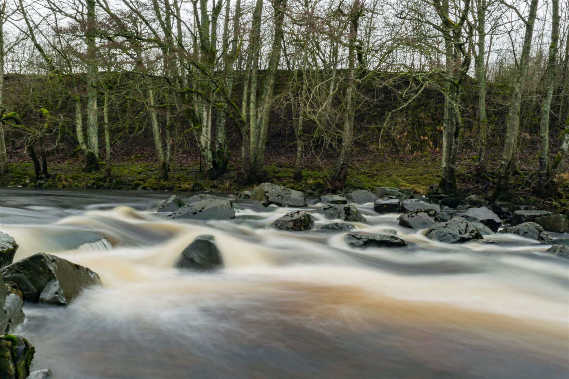 River in Full Flow A river in full flow, taken with a ND filter and a 15 scoond exposure by AJ Stoves Photography