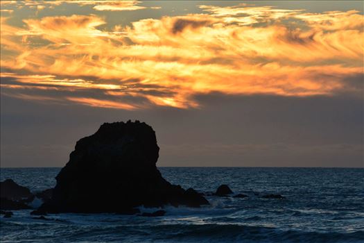 Fiery Sunset at Rockaway Beach by Bridget Oates Photography