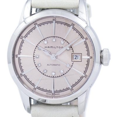 Hamilton American Classic Women’s Watch Features:
Stainless Steel Case,
Leather Strap,
Automatic Movement,
Caliber: 2681,
Sapphire Crystal,
Champagne/Pink Dial,
Diamond Accent,
Date Display,
See Through Case Back,
Buckle Clasp,
50M Water Resistance. by zetawatches