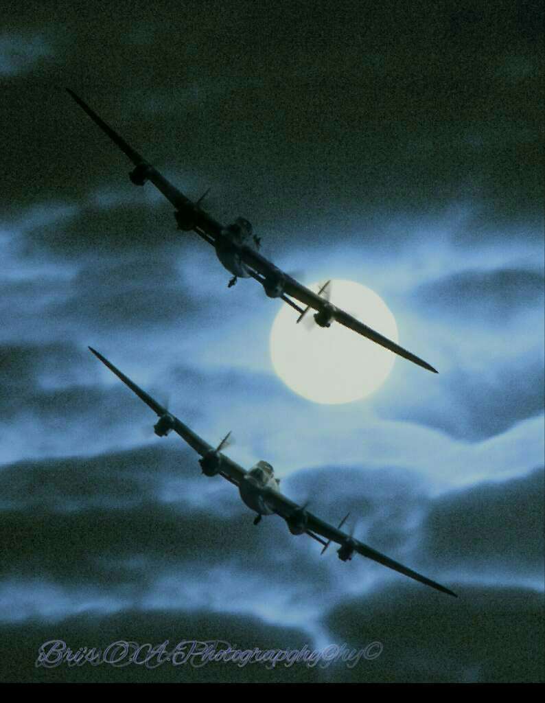 On A Mission 2 Avro Lancasters on a daring night time bombing mission under the glare of the full moon durin ww2 in 1944. by WPC-21