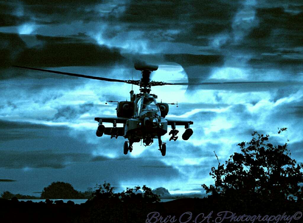Deadly Force A lonely British Army AH-64 Apache comin in low on a daring sneak attack on an enemy base under the glare of the full moon on a cold winters night. by WPC-21