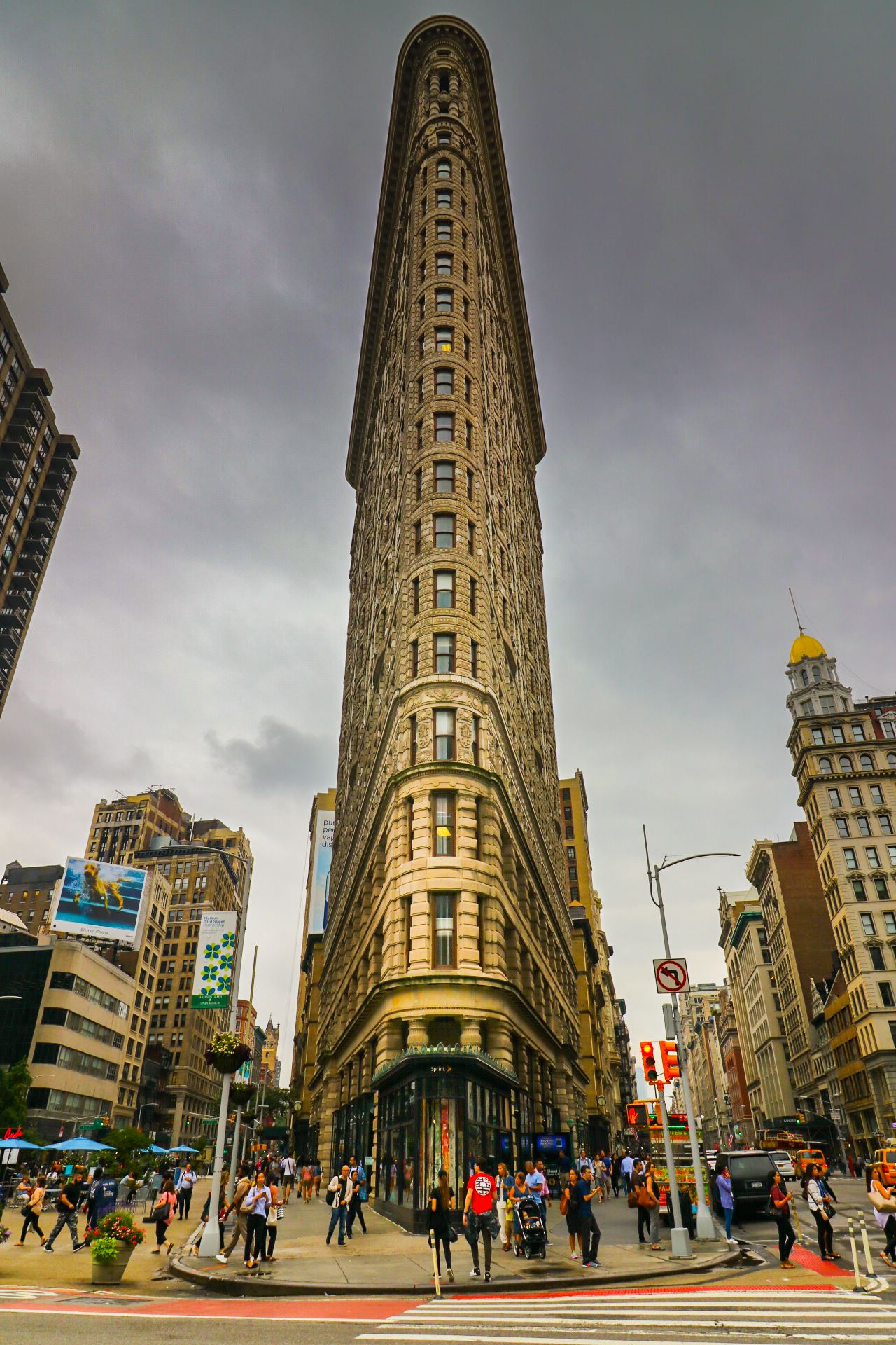 The Iconic Flatiron Building in New York The Flatiron building in Manhattan in New York is one of the most iconic and instantly recognised buildings in the city. It is formerly the Fuller Building. by Tony Keogh Photography
