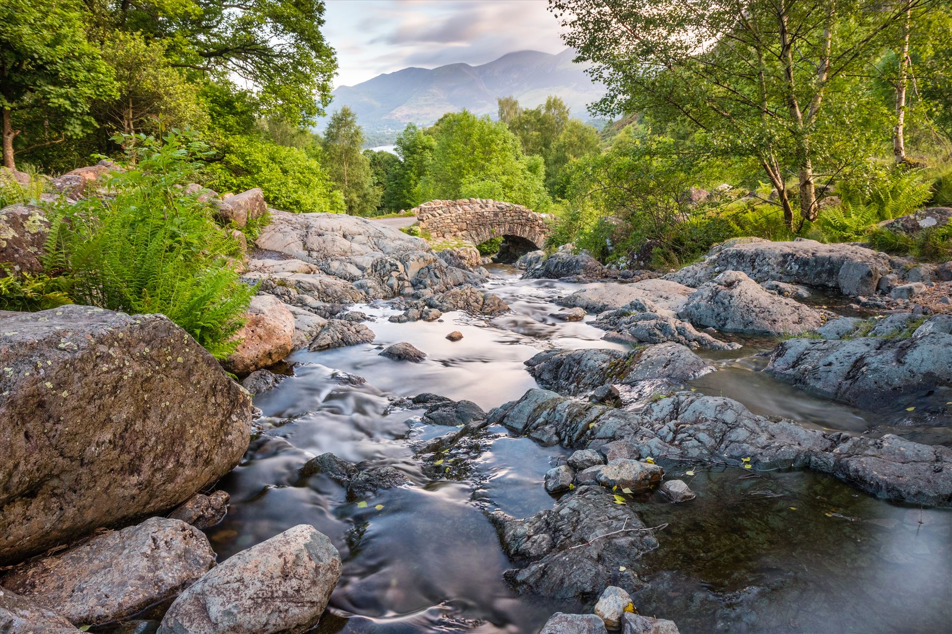 Ashness Bridge Long exposure early morning shot of Ashness Bridge in the Lake District near Keswick just off Derwent Water on the way up to Surprise View. by Tony Keogh Photography