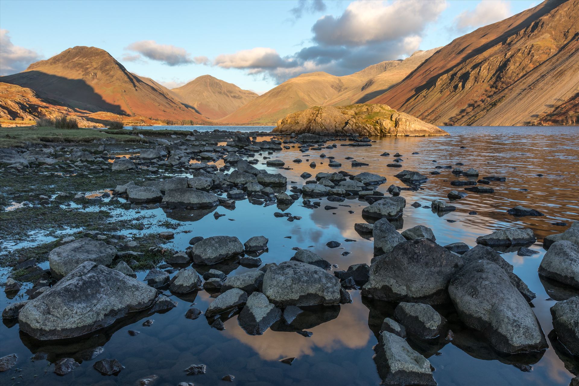 Wastwater in the Lake District Wastwater in the Lake District looking towards Wasdale Head shortly before sunset with the mountains of Scafell, Scafell Pike and Great Gable in the distance. by Tony Keogh Photography