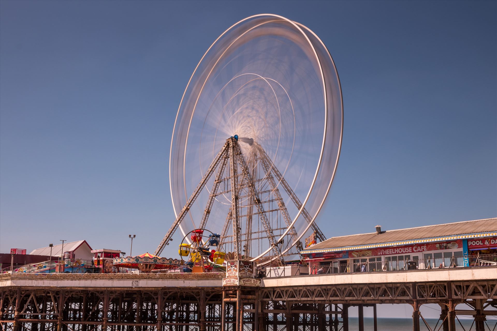 The Big Wheel on the Central Pier at Blackpool The Big Wheel on the Central Pier at Blackpool in full rotation.  by Tony Keogh Photography