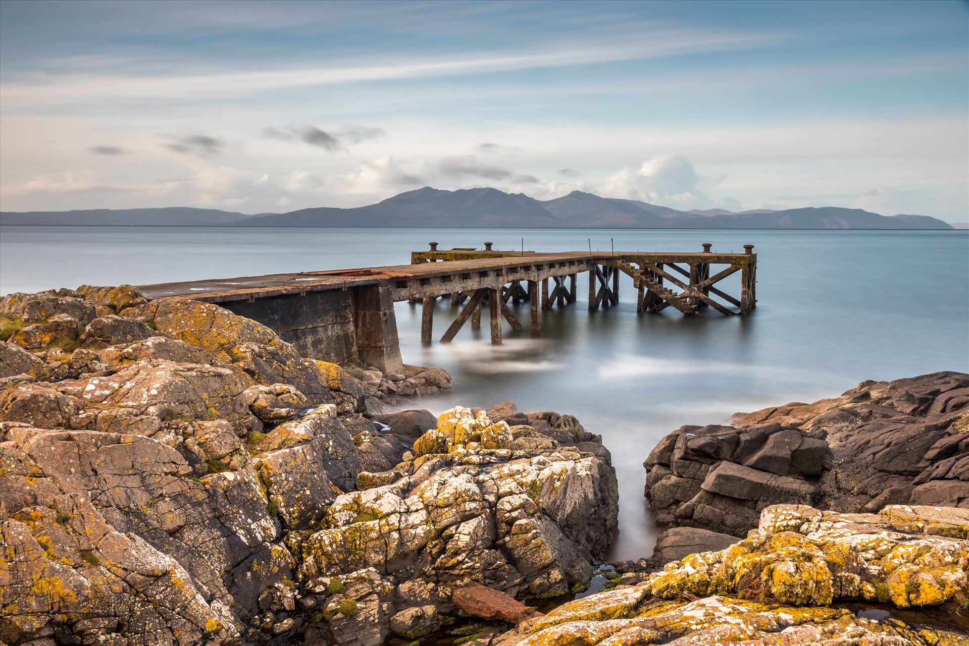 Portencross Jetty looking out to the Isle of Arran Portencross Jetty looking out to Arran on the South West Coast of Scotland.  by Tony Keogh Photography