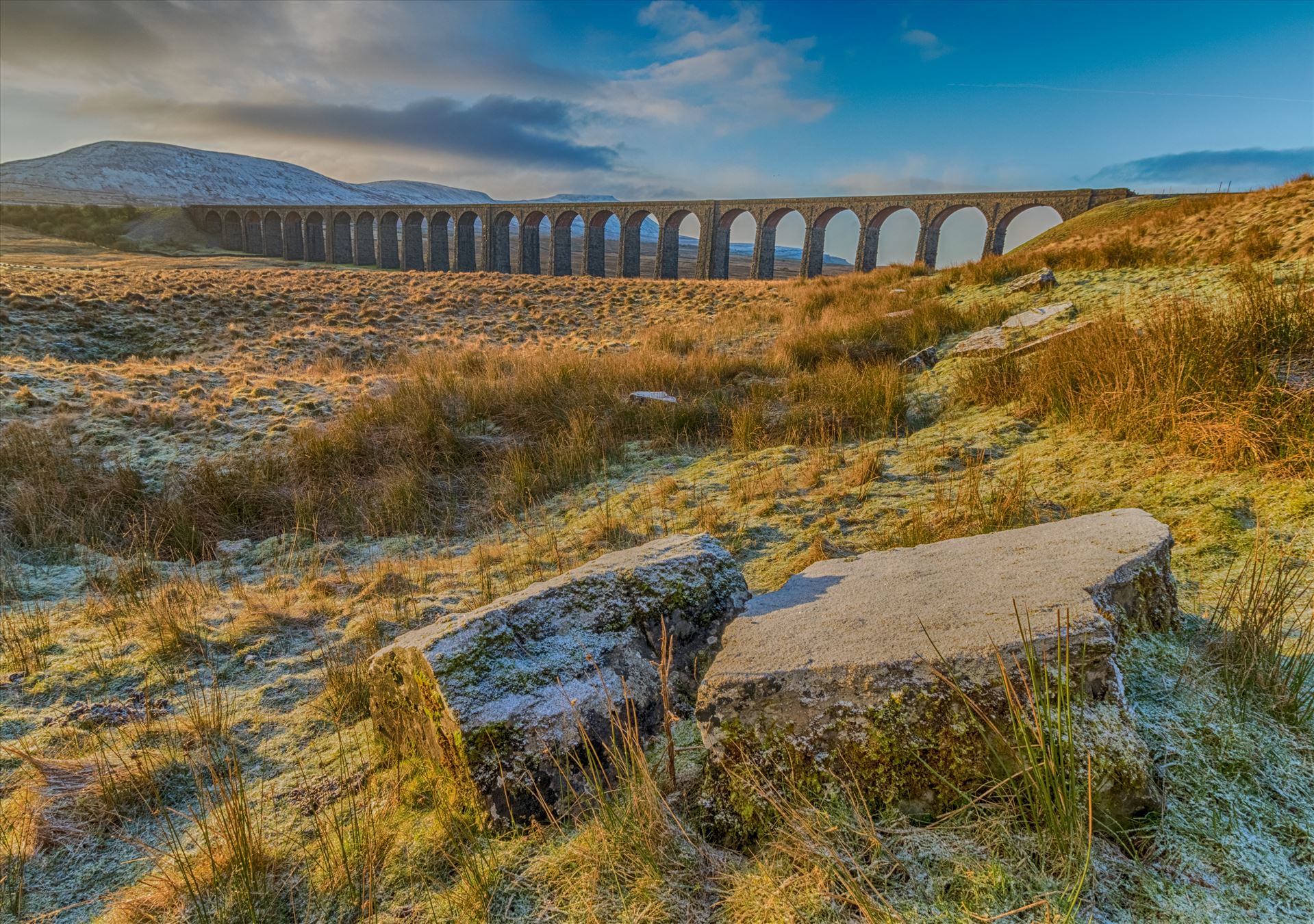 Ribblehead Viaduct 2 Sunrise at Ribblehead Viaduct in the Yorkshire Dales. Part of the Settle to Carlisle railway with Ingleborough in the background. by Tony Keogh Photography