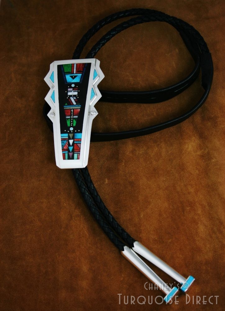 Jimmie Harrison https://www.turquoisedirect.com/product/jimmy-harrison-yei-inlay-bolo-tie-2/ by Turquoisedirect