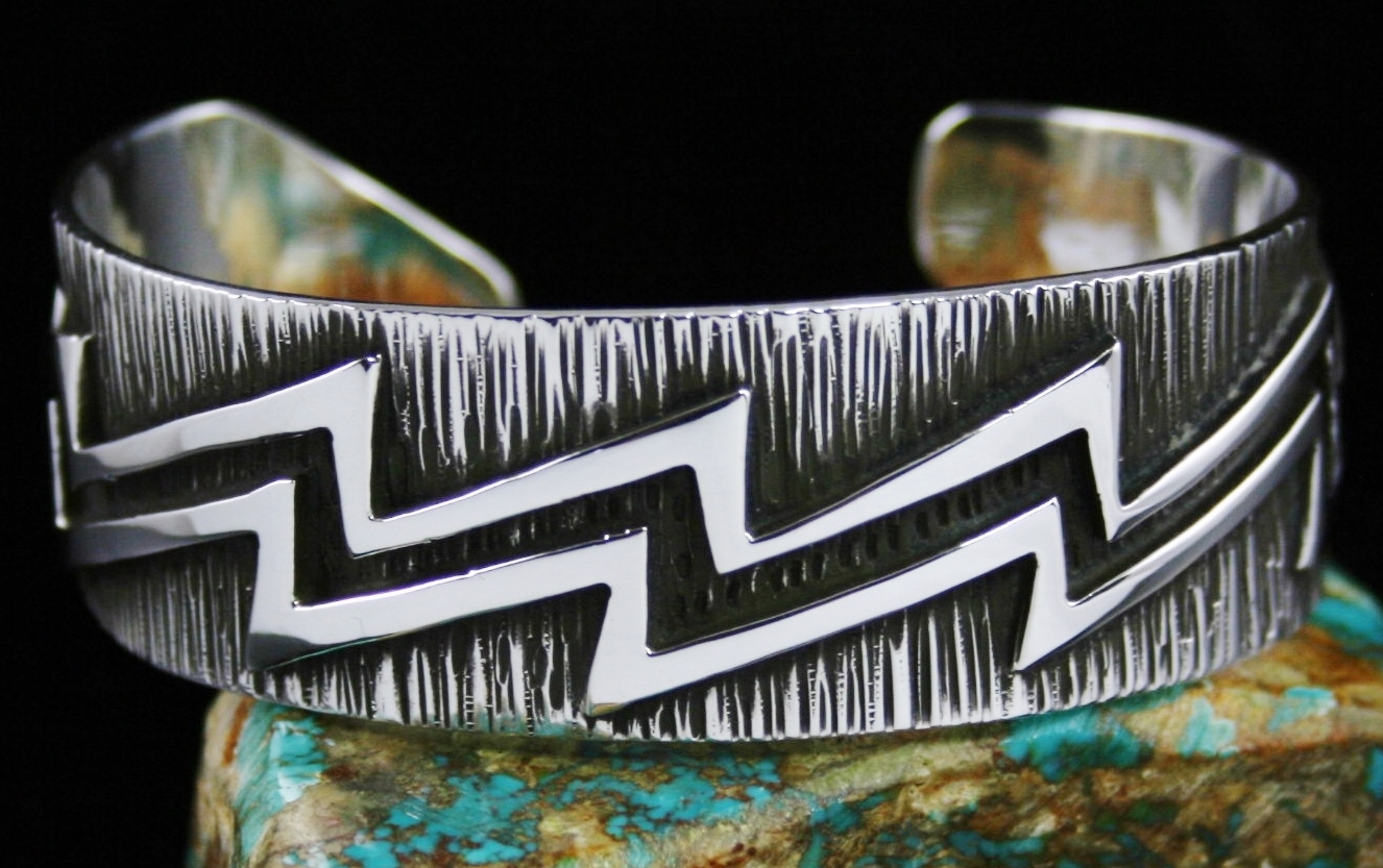 Kee Yazzie Lightning Design Overlay Bracelet Buy this beautiful lightning pattern bracelet created by Navajo jeweler Kee Yazzie from the online store of Turquoise Direct. http://www.turquoisedirect.com/product/kee-yazzie-lightning-design-overlay-bracelet/ by Turquoisedirect