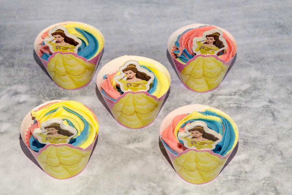 . These pretty, beauty and the beast cupcakes were piped in 3 colour buttercream, flavoured with raspberry ripple buttercream icing. Sat in Beauty and the Beast cupcake wraps and with Belle cupcake toppers, these were a big hit with the birthday girl. by Alison Wonderland Bakes