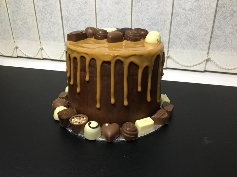 . This creation is not for the faint hearted! 4 layers of moist and rich chocolate fudge cake separated by salted caramel buttercream. All this is then surrounded by a thick layer of decadent chocolate ganache topped with salted caramel drip. by Alison Wonderland Bakes