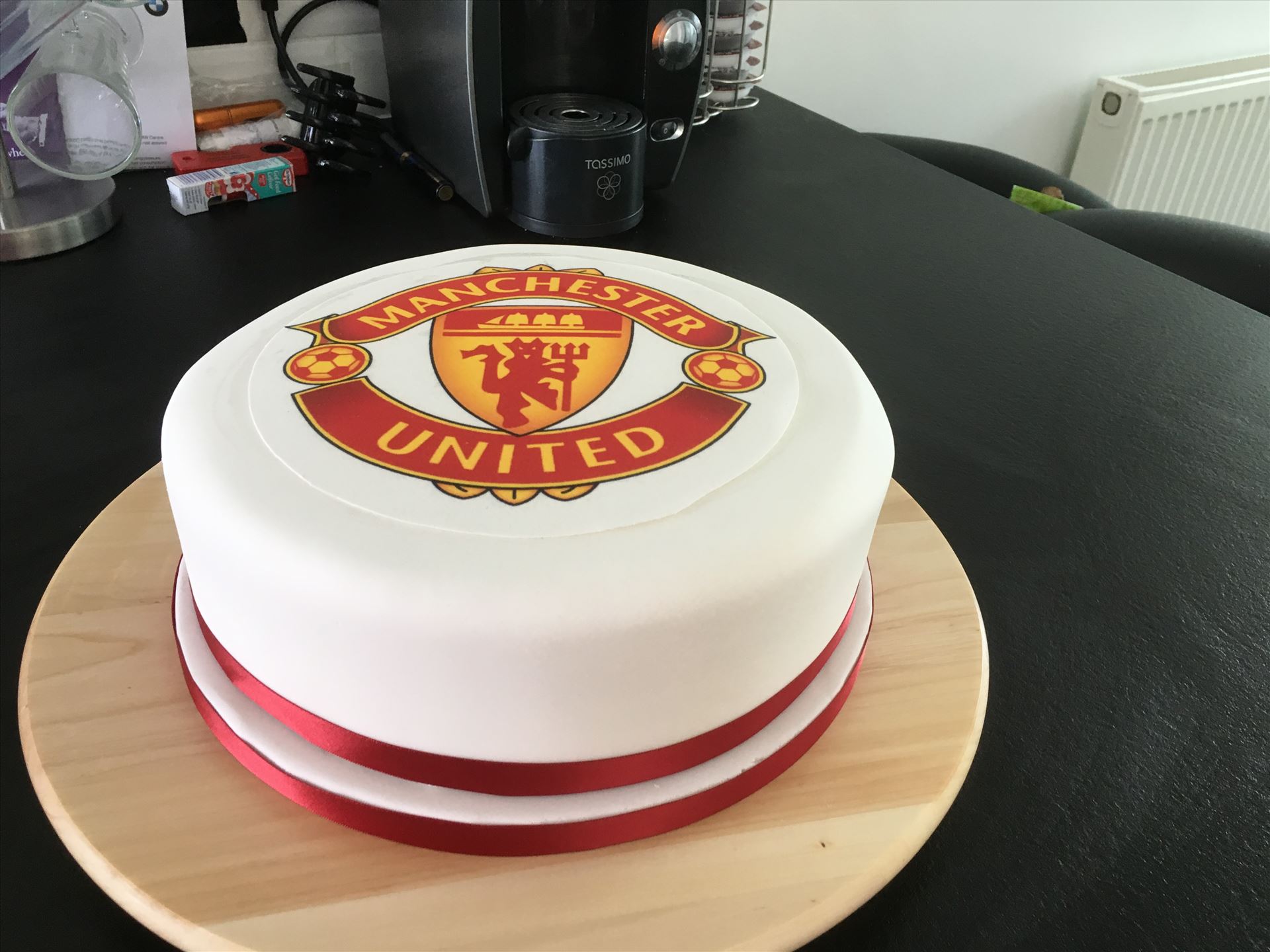 Manchester United cake. Lemon cake with white chocolate ganache.  Very moist cake drizzled with lemon syrup on each layer. by Alison Wonderland Bakes