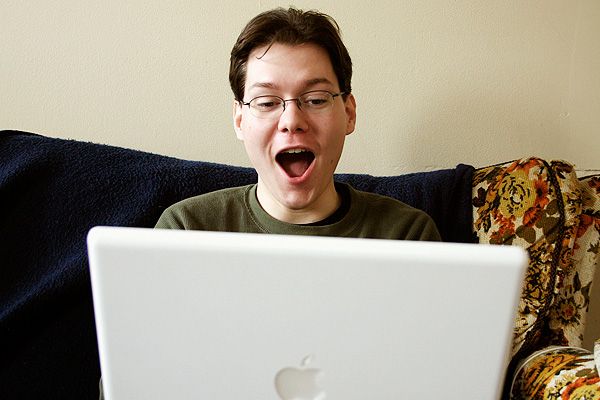 happy-man-with-laptop.jpg  by cash photo