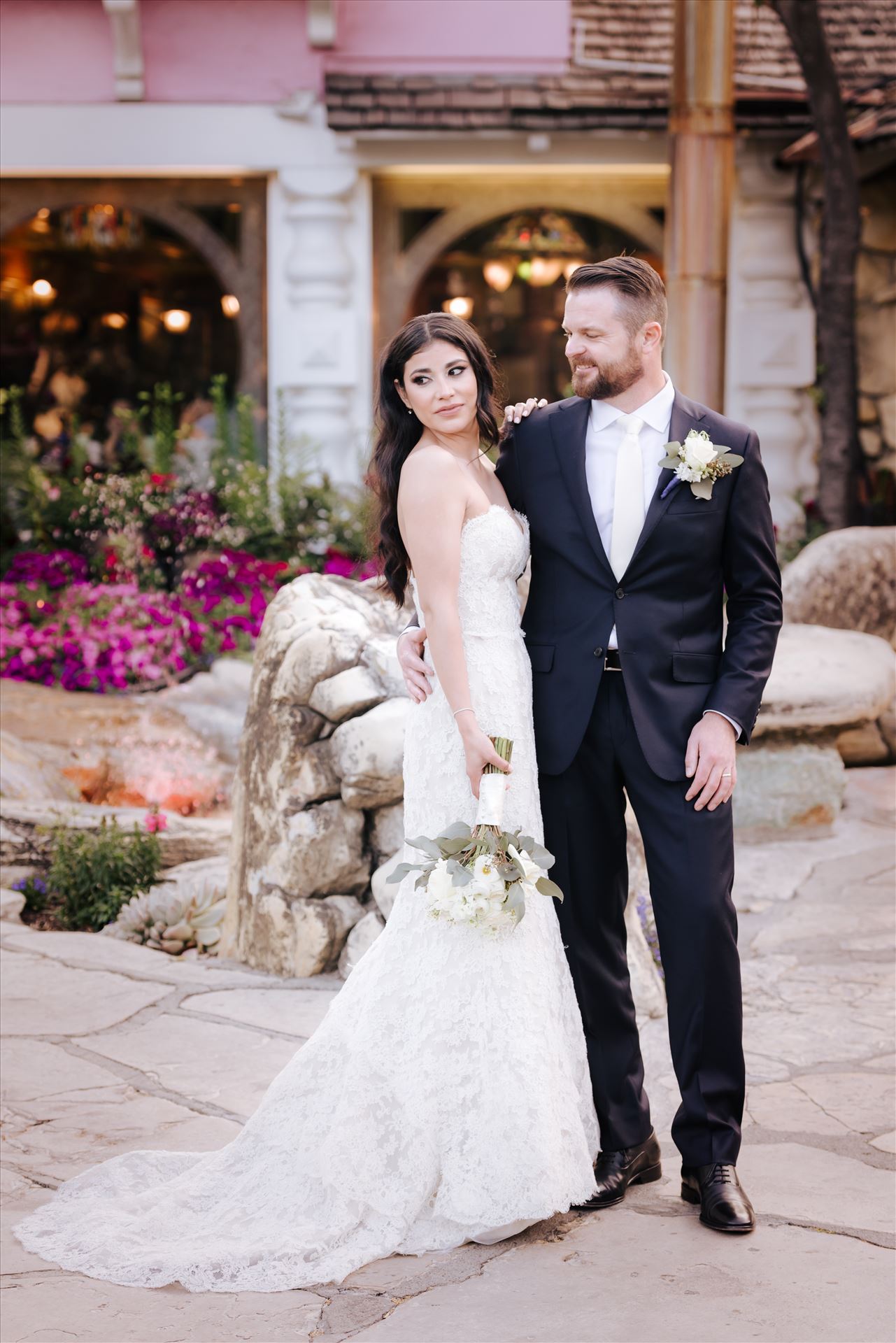SP Gallery-5804.JPG Mirror's Edge Photography captures Xochitl and David's magical Madonna Inn Wedding in San Luis Obispo, California. Bride and Groom in front of the Madonna Inn Restaurant and garden. by Sarah Williams