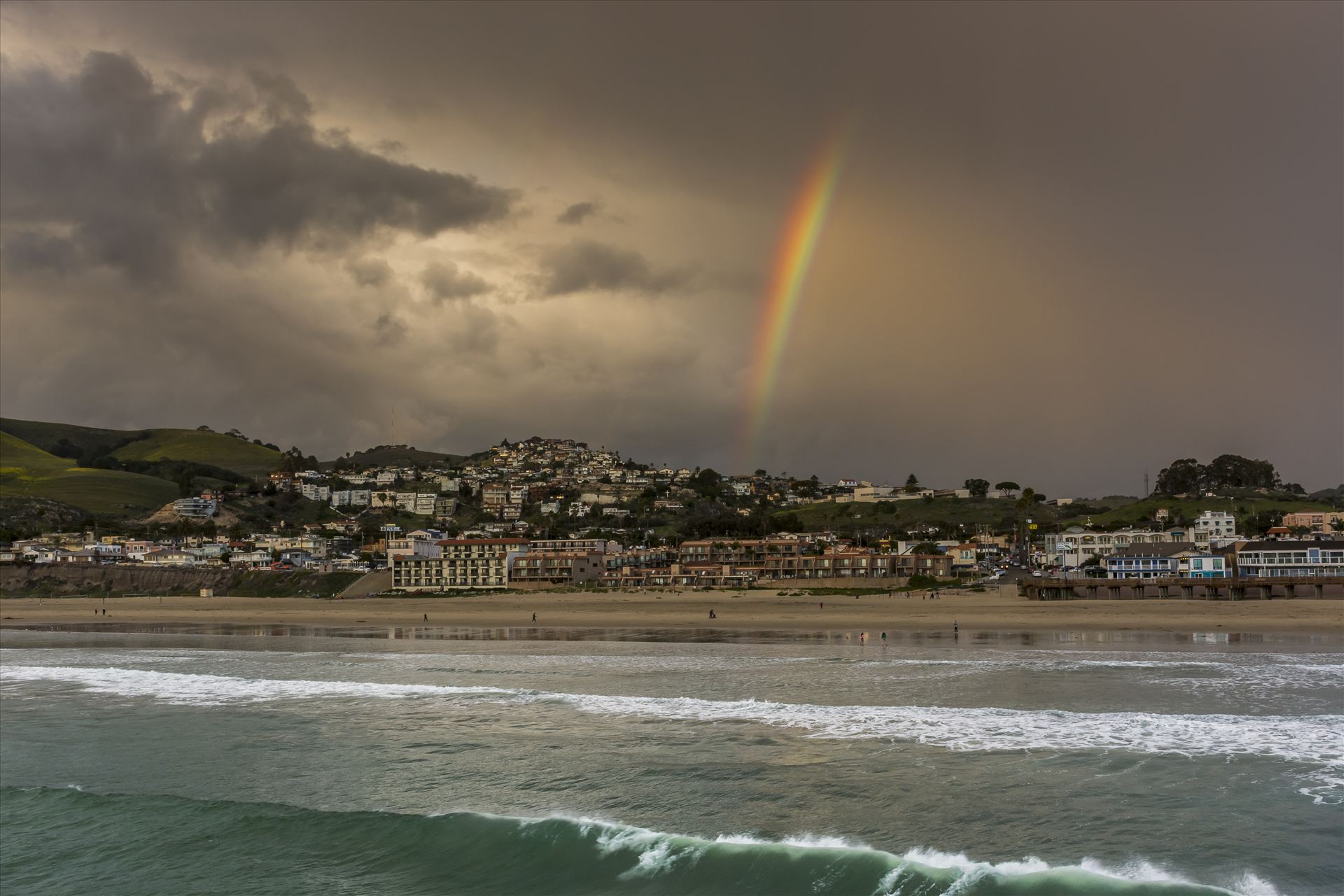 End of the Rainbow Pismo.jpg Rainbow's end over downtown Pismo Beach - where ocean and sand meet stormy sky. by Sarah Williams