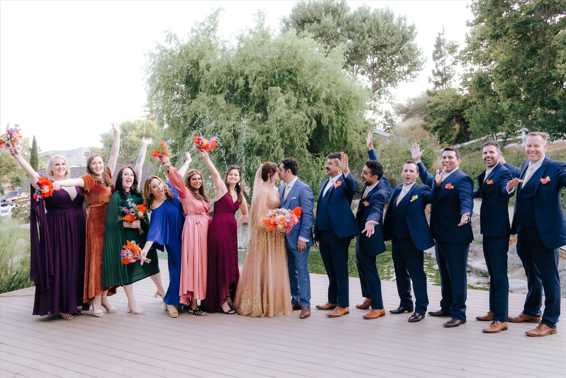 Final-7685.JPG A gorgeous Madonna Inn Wedding by Mirror's Edge Photography a San Luis Obispo Wedding and Engagement Photographer.  Bride and Groom at sunset.  70's theme wedding bridal party by Sarah Williams