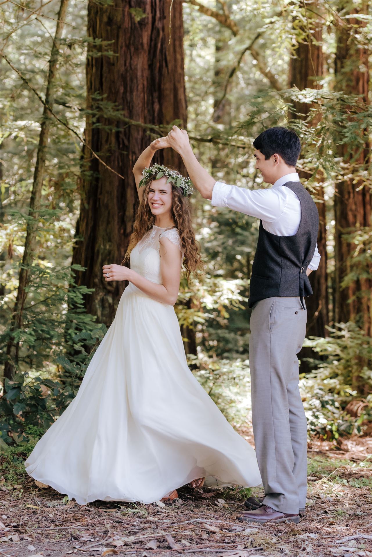 FW-6667.JPG Mt Madonna wedding in the redwoods outside of Watsonville, California with a romantic and classic vibe by sarah williams of mirror's edge photography a san luis obispo wedding photographer.  Bride and Groom dancing in the forest by Sarah Williams