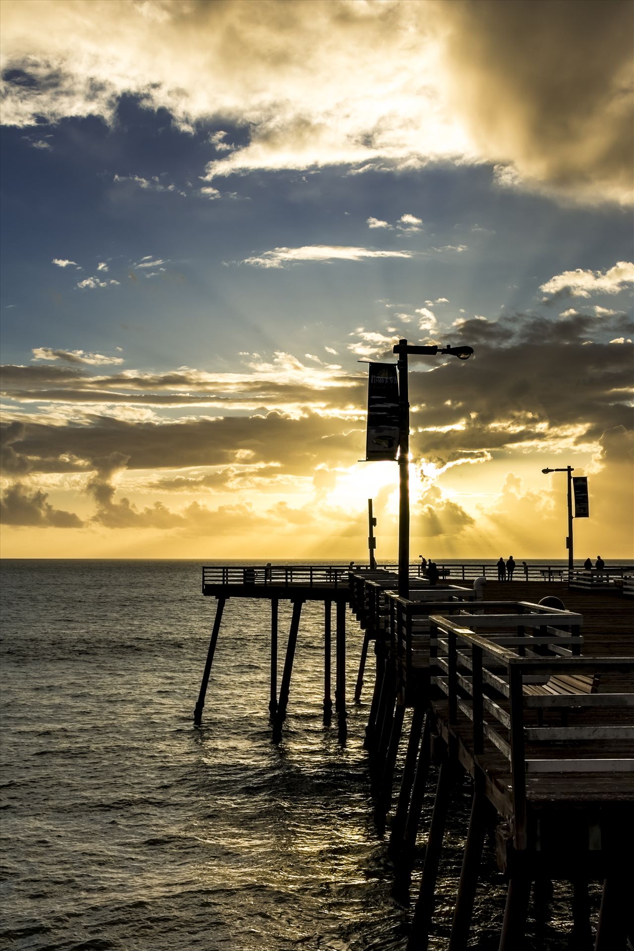 Pismo Pier Sunrays.jpg Sunset sun rays say good evening to Pismo Beach pier by Sarah Williams
