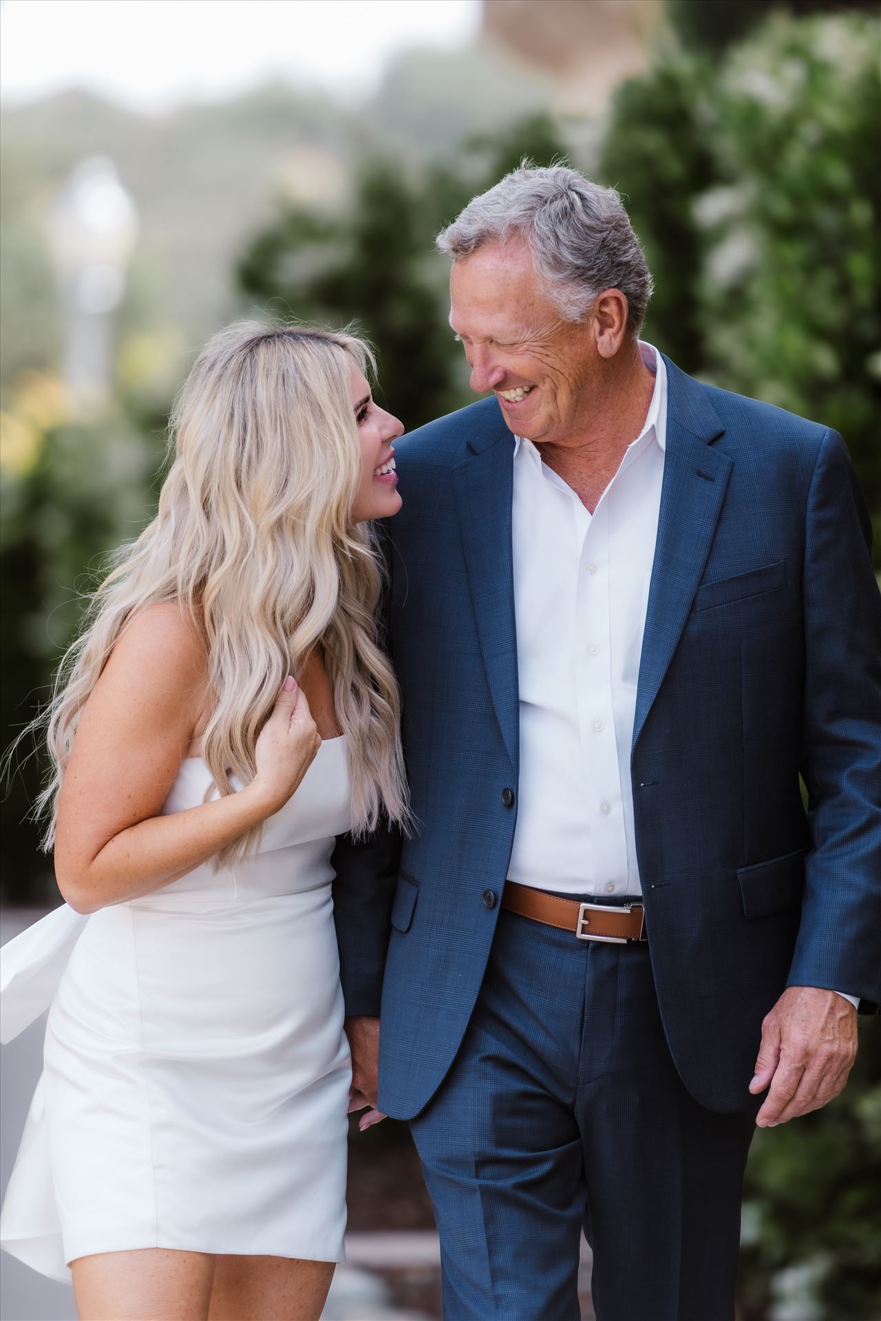 For Website--3.jpg Allegretto Vineyard Resort wedding in Paso Robles California in San Luis Obispo County by Mirror's Edge Photography.  Beautiful Italian Tuscan style villa for upscale wedding day vibes on the Central Coast.  Bride and Groom walking through vineyard. by Sarah Williams