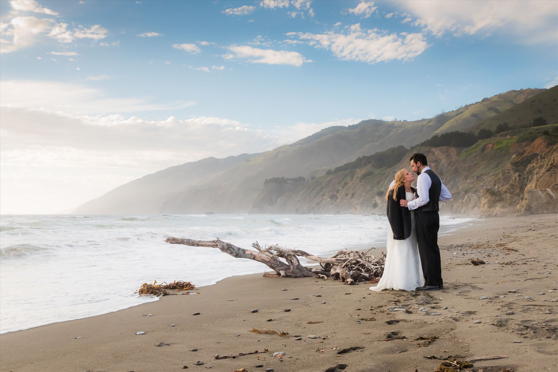 Adele and Jason 27 Ragged Point Inn Wedding Elopement photography by Mirror's Edge Photography in San Simeon Cambria California. Bride and Groom at Ragged Point Beach at sunset by Sarah Williams