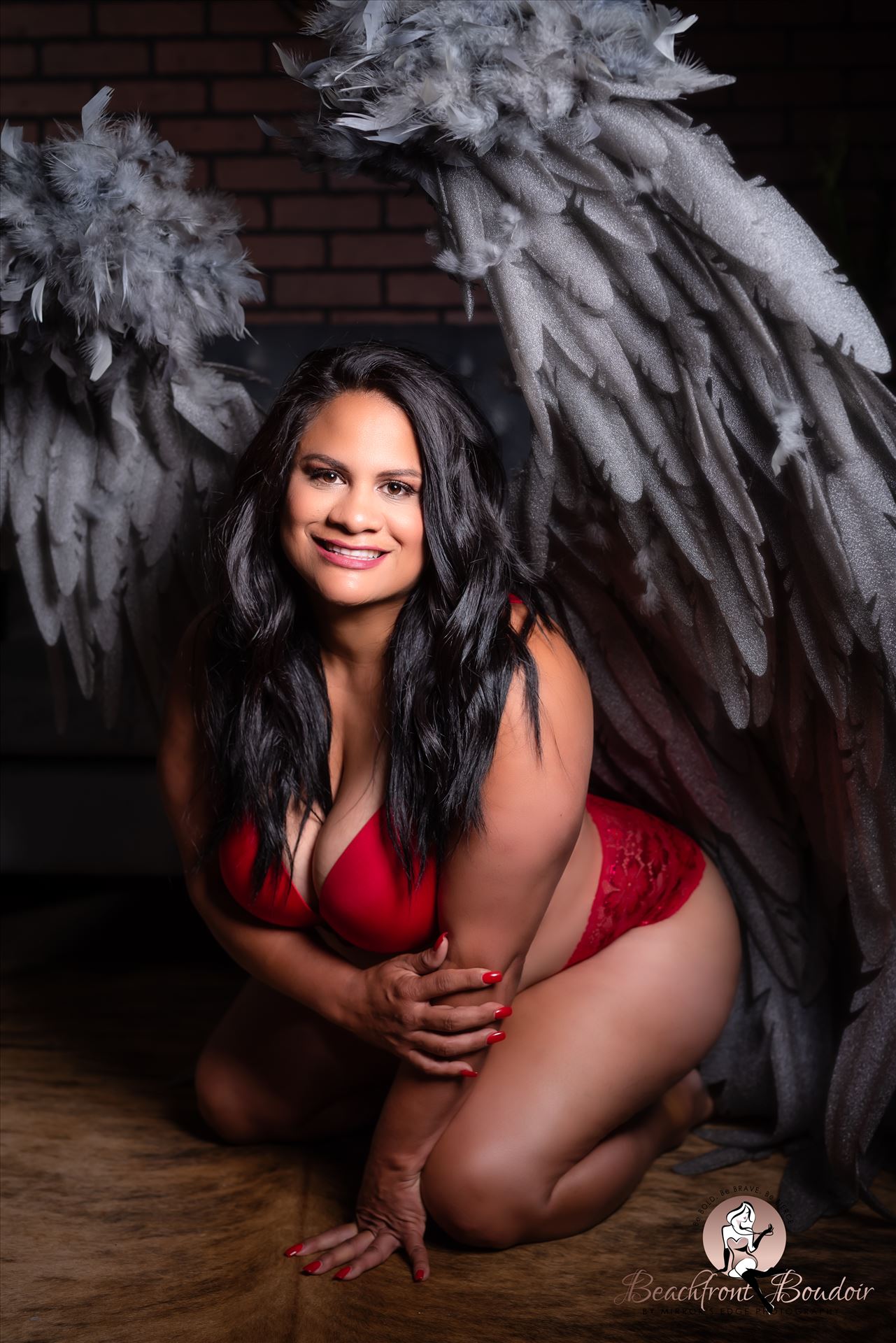 Port.JPG Beachfront Boudoir by Mirror's Edge Photography is a Boutique Luxury Boudoir Photography Studio located in San Luis Obispo County. My mission is to show as many women as possible how beautiful they truly are! Best curvy boudoir poses with wings by Sarah Williams