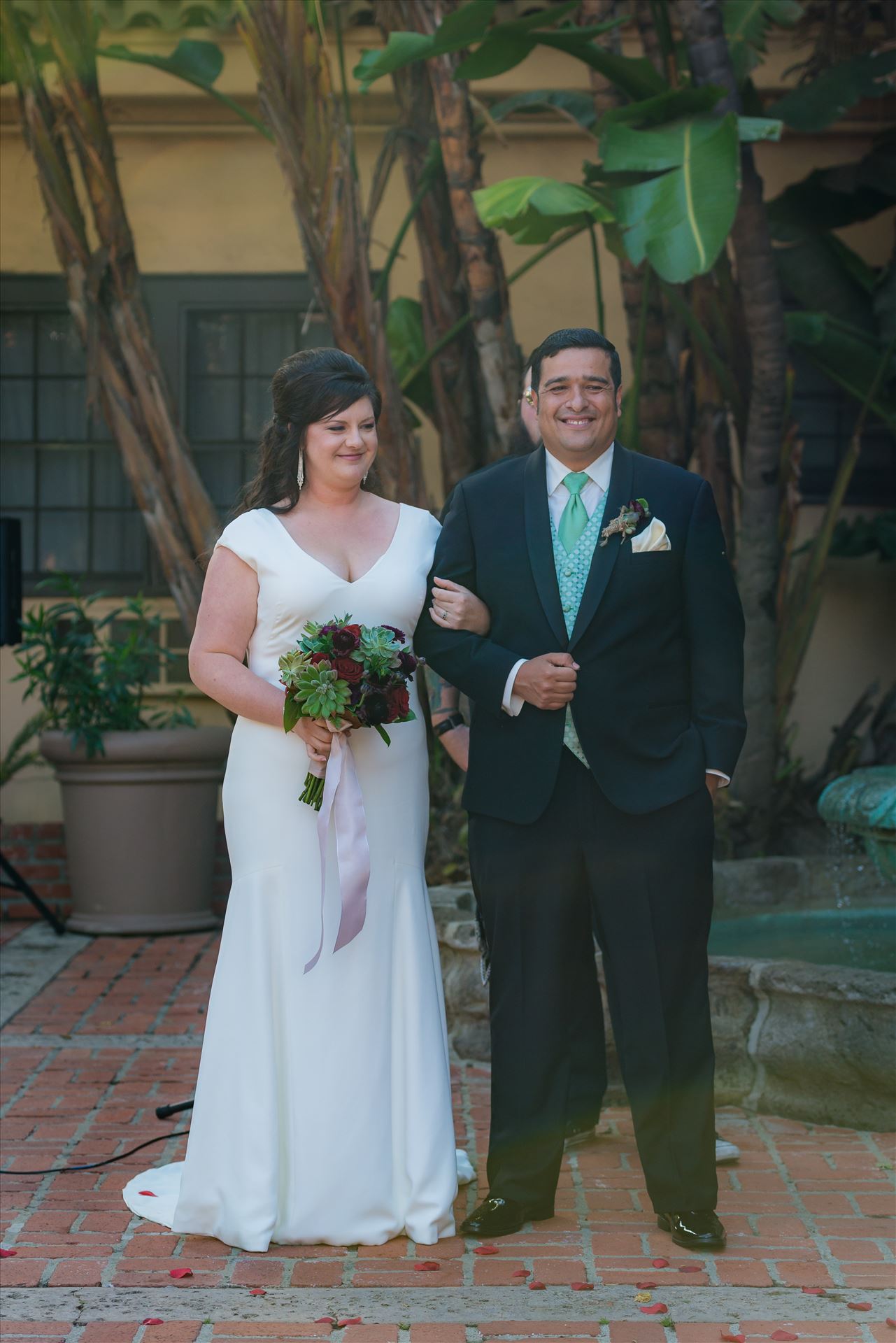 Mary and Alejandro 26 Wedding photography at the Historic Santa Maria Inn in Santa Maria, California by Mirror's Edge Photography. After saying I Do. by Sarah Williams