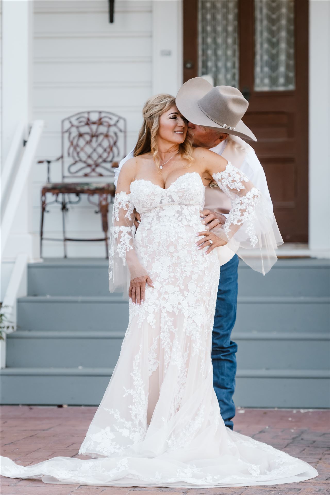 Final BG--25.jpg MJM Chandler Ranch wedding in Paso Robles California in San Luis Obispo County by Mirror's Edge Photography.  Beautiful country venue in the heart of paso robles.  Bride and Groom at the Farmhouse kissing. by Sarah Williams