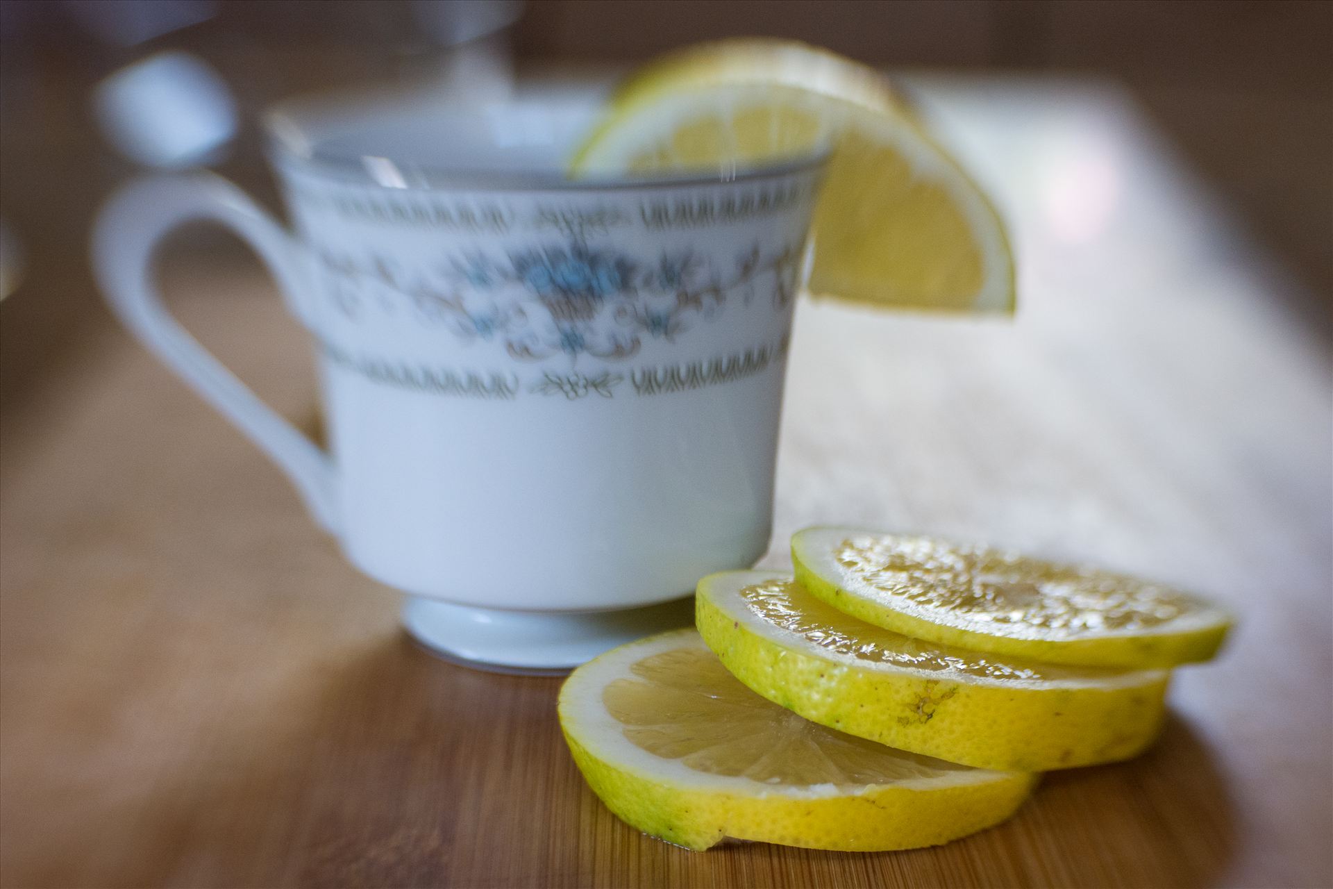 Tea With Lemon.jpg Morning tea with fresh sliced lemon by Sarah Williams