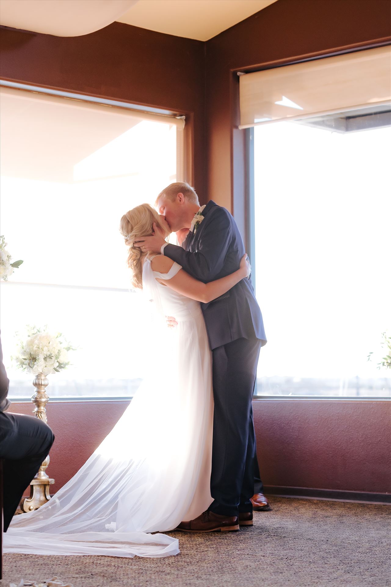 FW-8131.JPG Sarah Williams of Mirror's Edge Photography, a San Luis Obispo Wedding and Engagement Photographer, captures Ryan and Joanna's wedding at the iconic Windows on the Water Restaurant in Morro Bay, California.  Bride and Groom kiss after I Do. by Sarah Williams