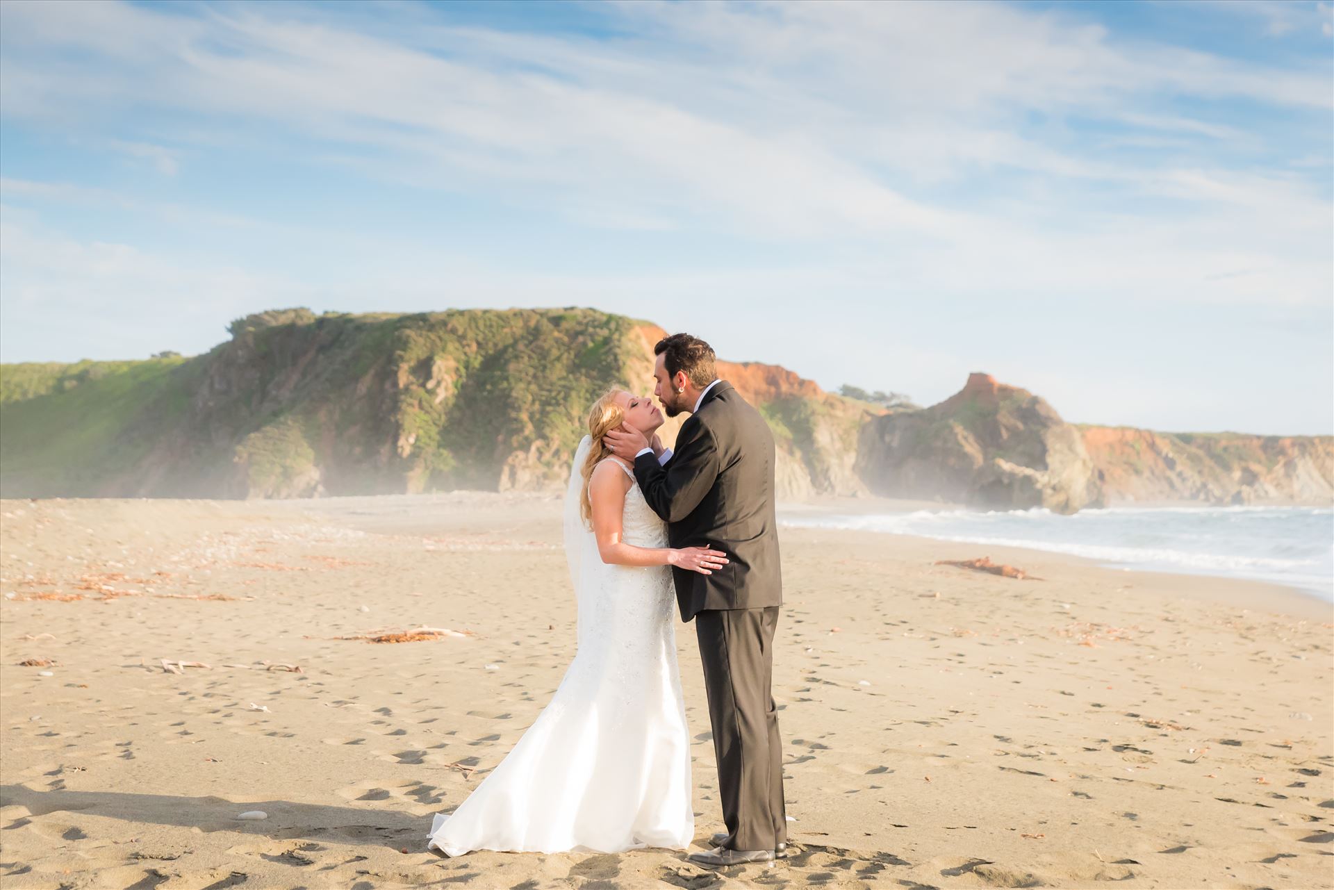 Adele and Jason 23 Ragged Point Inn Wedding Elopement photography by Mirror's Edge Photography in San Simeon Cambria California. Bride and Groom at sunset on the beach. Big Sur Wedding Photography by Sarah Williams