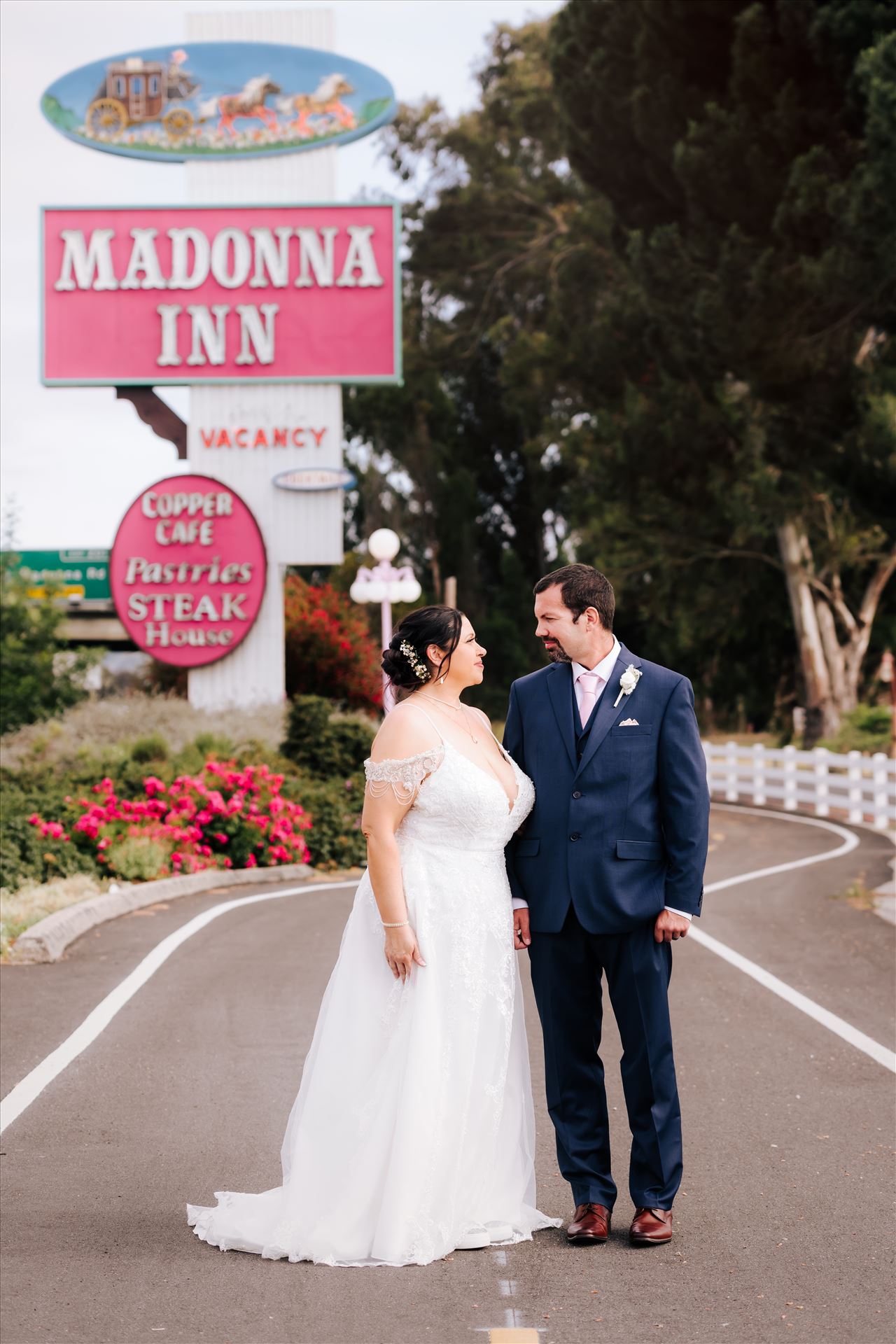 Sneak Peek--11.JPG Mirror's Edge Wedding Photography, a San Luis Obispo and Santa Barbara County photographer capture the Nagy's Madonna Inn Wedding. Madonna Inn Sign. by Sarah Williams