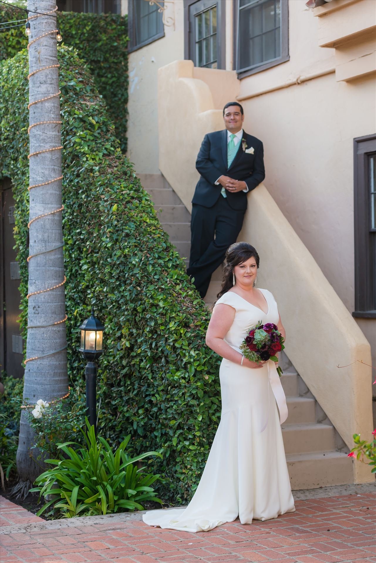 Mary and Alejandro 17 Wedding photography at the Historic Santa Maria Inn in Santa Maria, California by Mirror's Edge Photography. Bride and Groom on the Ivy Staircase. by Sarah Williams