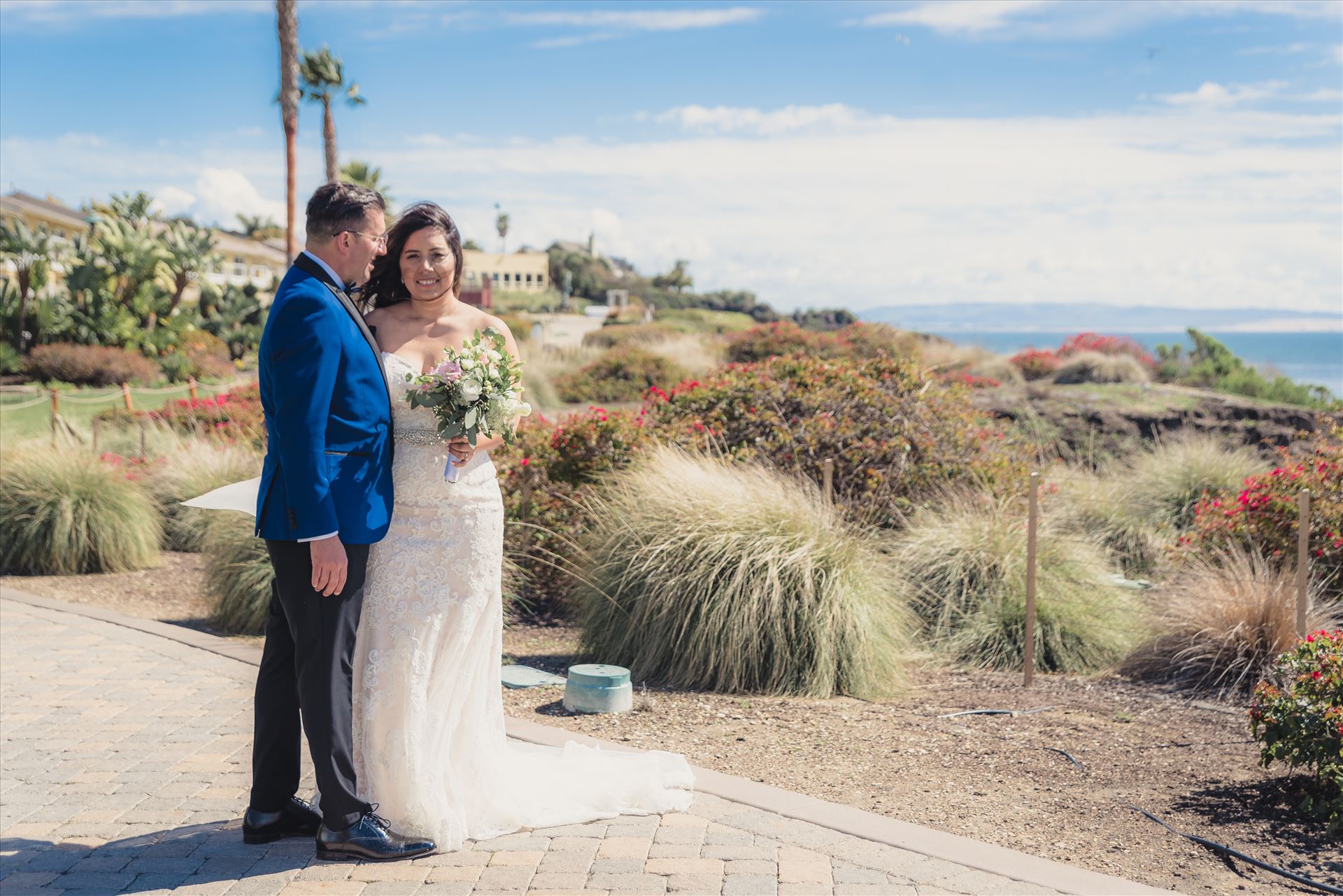 Candy and Christopher 22 Wedding at Dolphin Bay Resort and Spa in Shell Beach, California by Sarah Williams of Mirror's Edge Photography, a San Luis Obispo County Wedding Photographer. Bride and Groom overlooking Pismo Beach by Sarah Williams