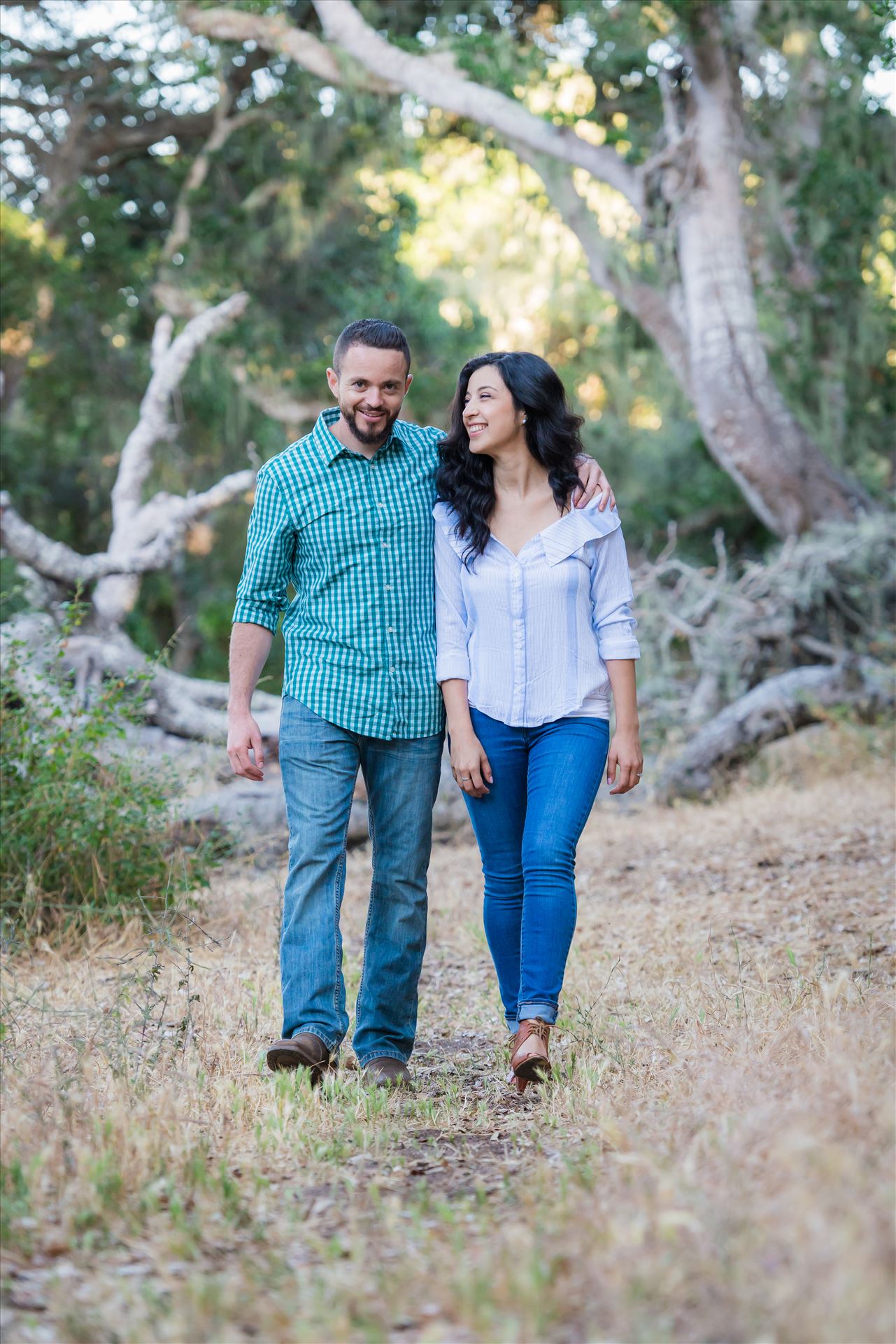 Cinthya and Carlos 55 Los Osos State Park Reserve Engagement Photography and Wedding Photography by Mirror's Edge Photography.  Walking through the woods by Sarah Williams