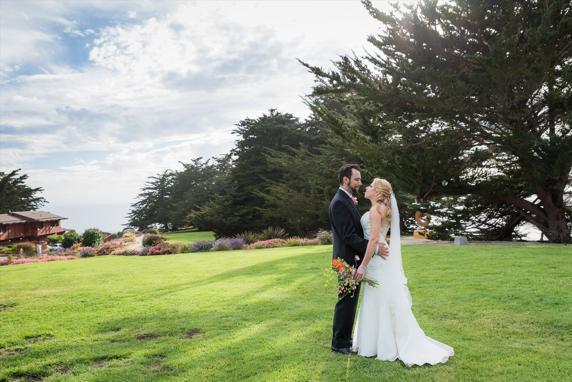 Adele and Jason 50 Ragged Point Inn Wedding Elopement photography by Mirror's Edge Photography in San Simeon Cambria California. Ragged Point Inn lawn bride and groom. Big Sur Wedding Photography by Sarah Williams