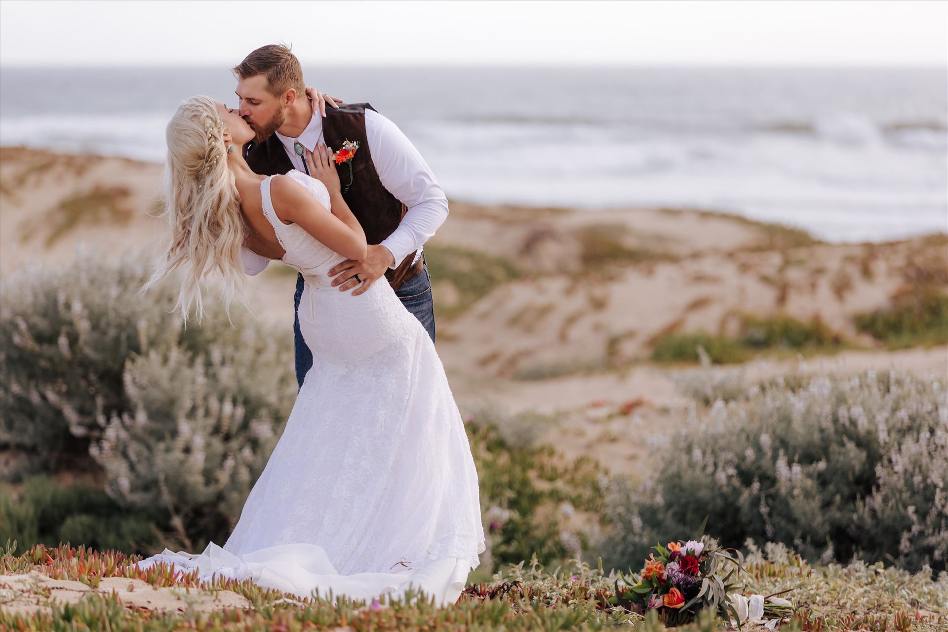 _Y9A6909.JPG Pismo Beach Wedding in San Luis Obispo County by Mirror's Edge Photography.  Gorgeous windswept beach wedding vibes with a country and boho flair.  Dip on the beach with ocean behind by Sarah Williams