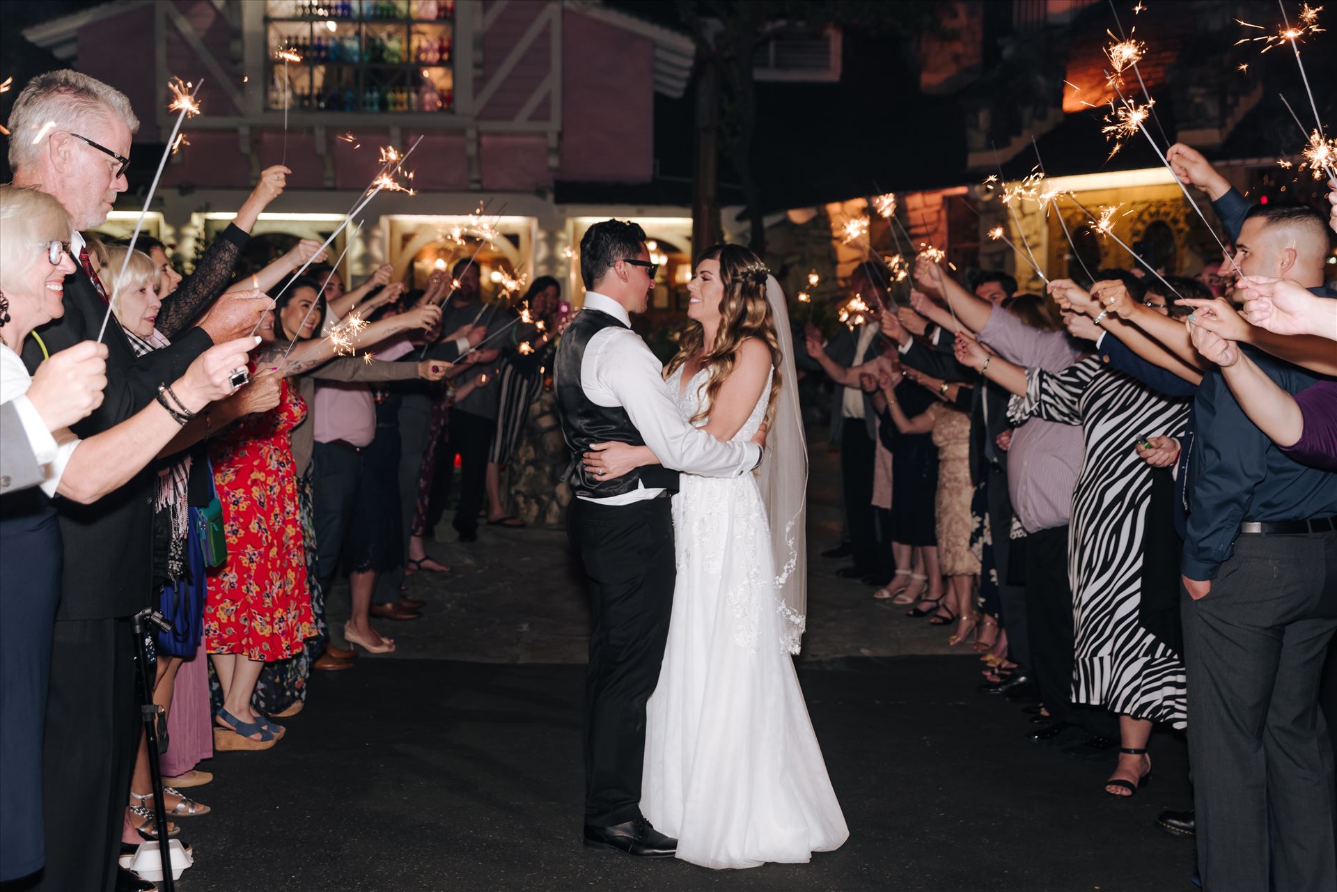 FW-8559.JPG Mirror's Edge Photography, a San Luis Obispo Wedding and Engagement Photographer, captures Rashel and Brian's Wedding Day at the Madonna Inn in San Luis Obispo. Sparkler exit. by Sarah Williams