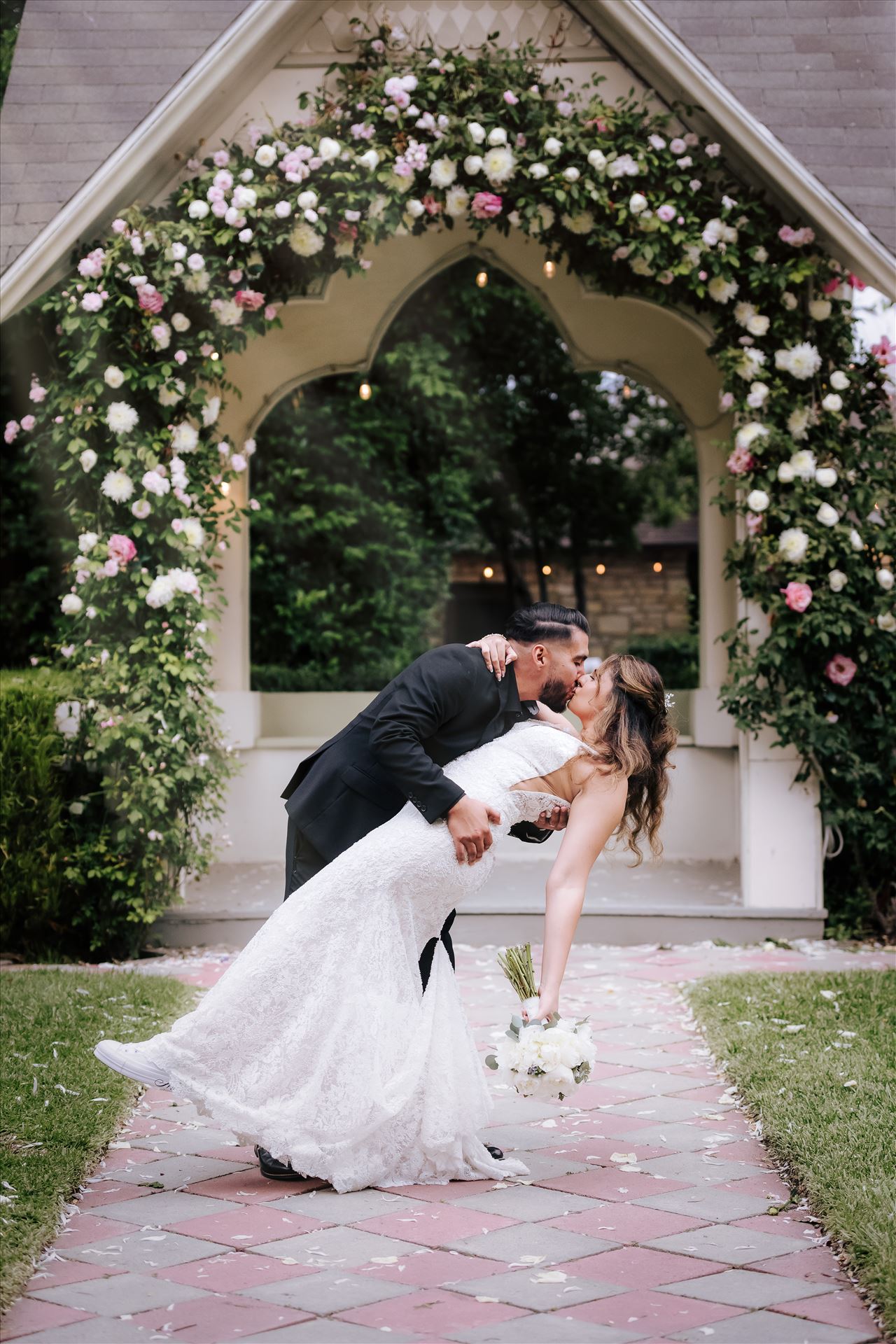 Final--14.JPG Kaleidoscope Inn and Gardens wedding in Nipomo in San Luis Obispo County by Mirror's Edge Photography.  Gorgeous rose gardens and Victorian home vibe with romance and deep colors.  Bride and Groom dip by Sarah Williams