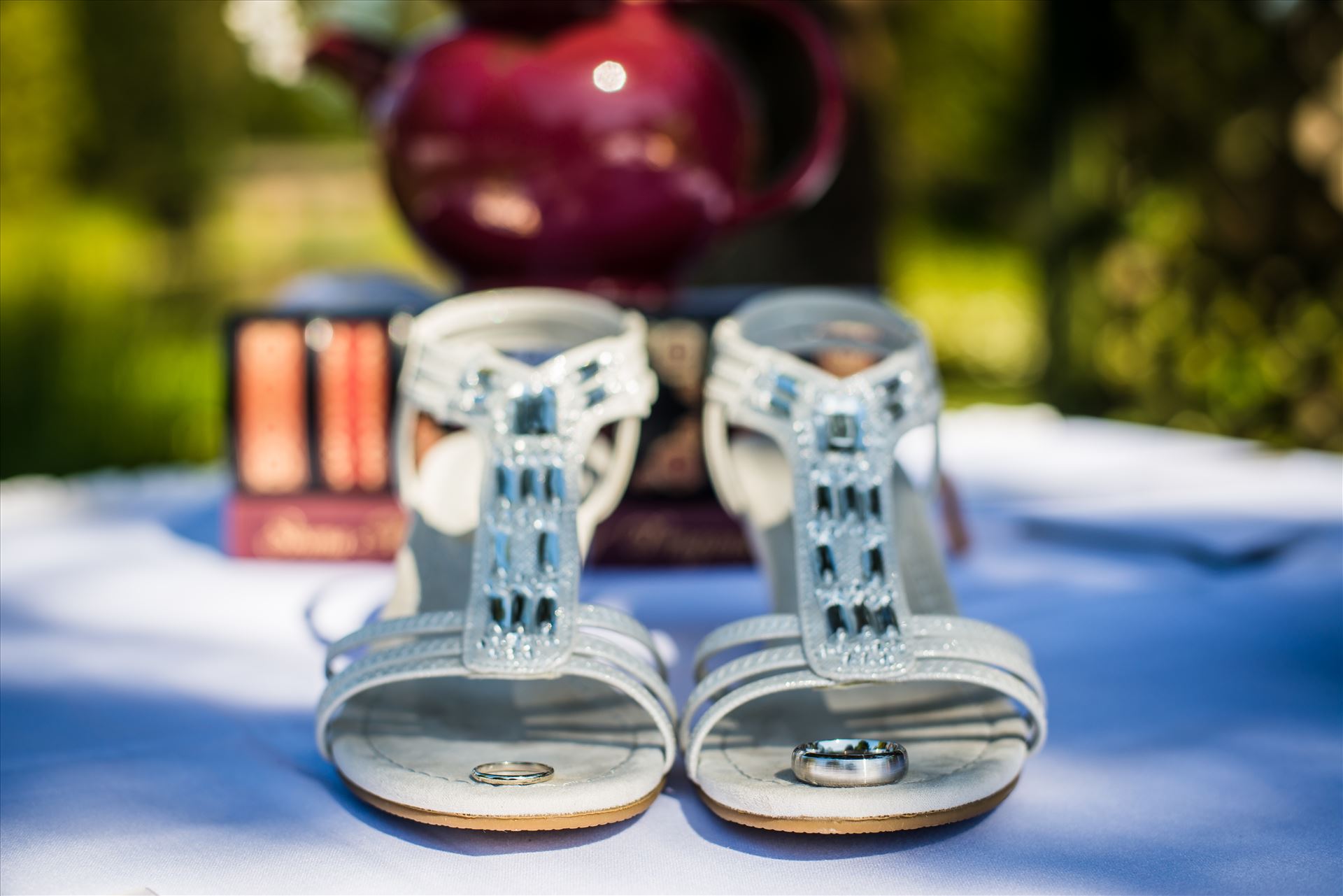 Renae and Brian 008 Mirror's Edge Photography captures a high tea wedding at the Cypress Ridge Golf Club and Pavilion in Arroyo Grande, California.  Rings, shoes and a tea pot. by Sarah Williams