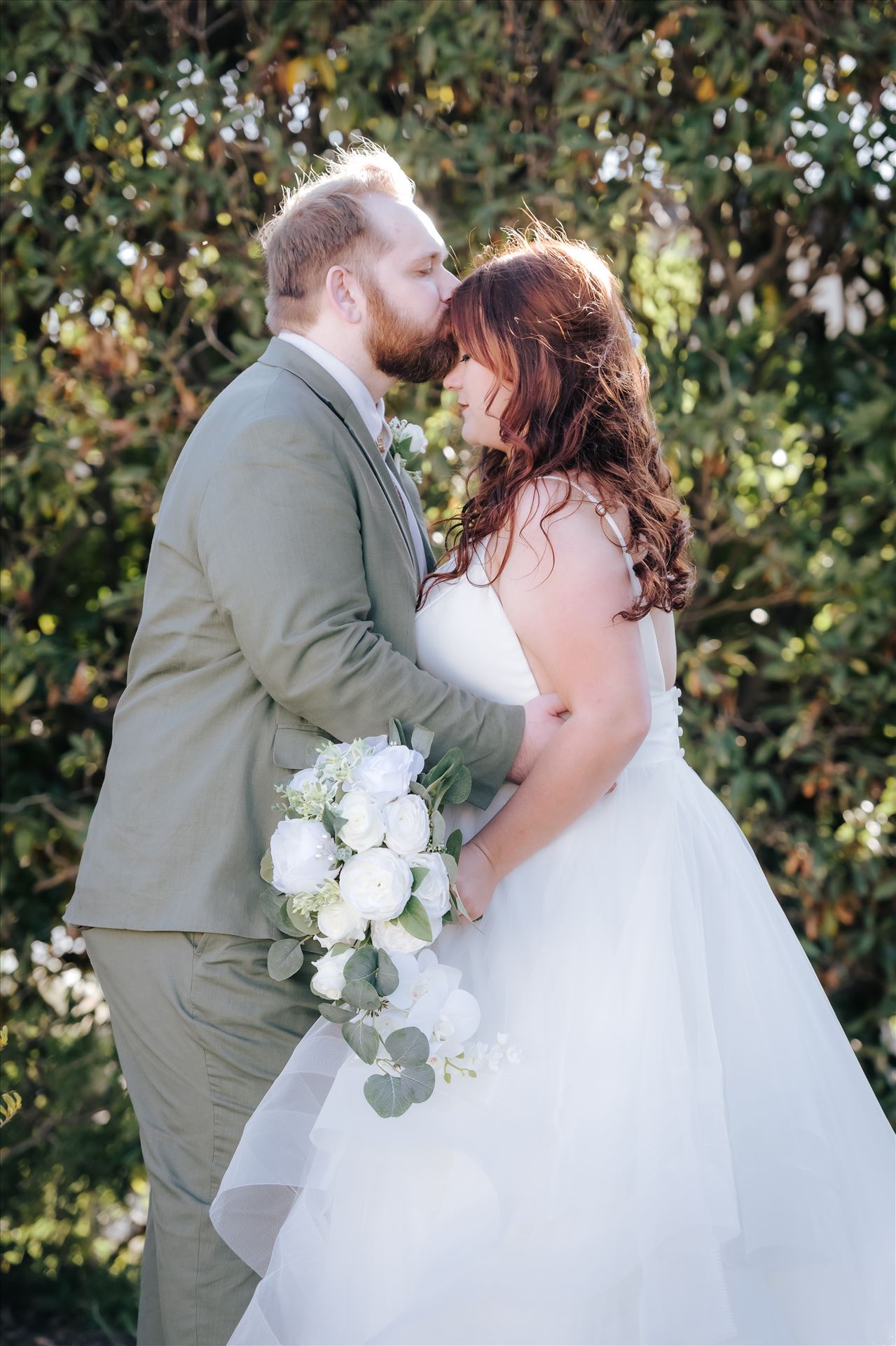 Final-.jpg Sarah Williams of Mirror's Edge Photography, a San Luis Obispo County Wedding and Engagement Photographer, captures the amazing wedding of Justine and Reece at the Monday Club in San Luis Obispo California. Gorgeous Bride and Groom forehead kiss by Sarah Williams