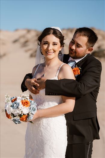 Sarah Williams of Mirror's Edge Photography, a San Luis Obispo Wedding, Engagement and Portrait photographer, captures the wedding of Annalee and Junior on the Oceano Dunes SVRA in Oceano California.