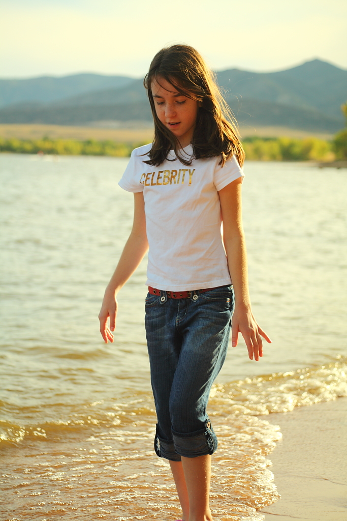 Allie on the Beach My daughter wwlking on the beach at Chatfield Resevoir, CO. by Scott Smith Photos