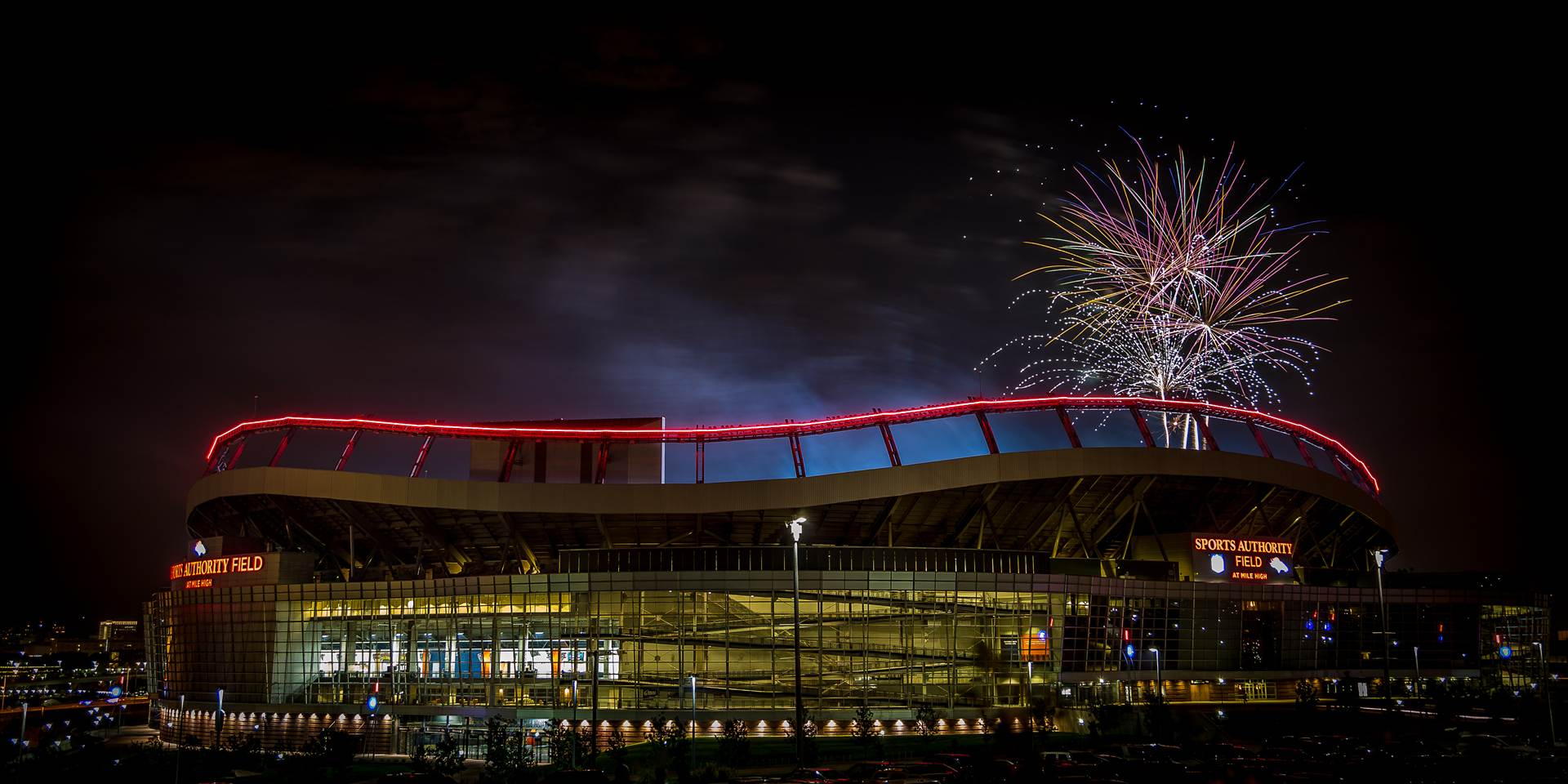 Fireworks at Mile High Stadium Fireworks over Mile High Stadium in Denver, Colorado on the Fourth of July. by Scott Smith Photos