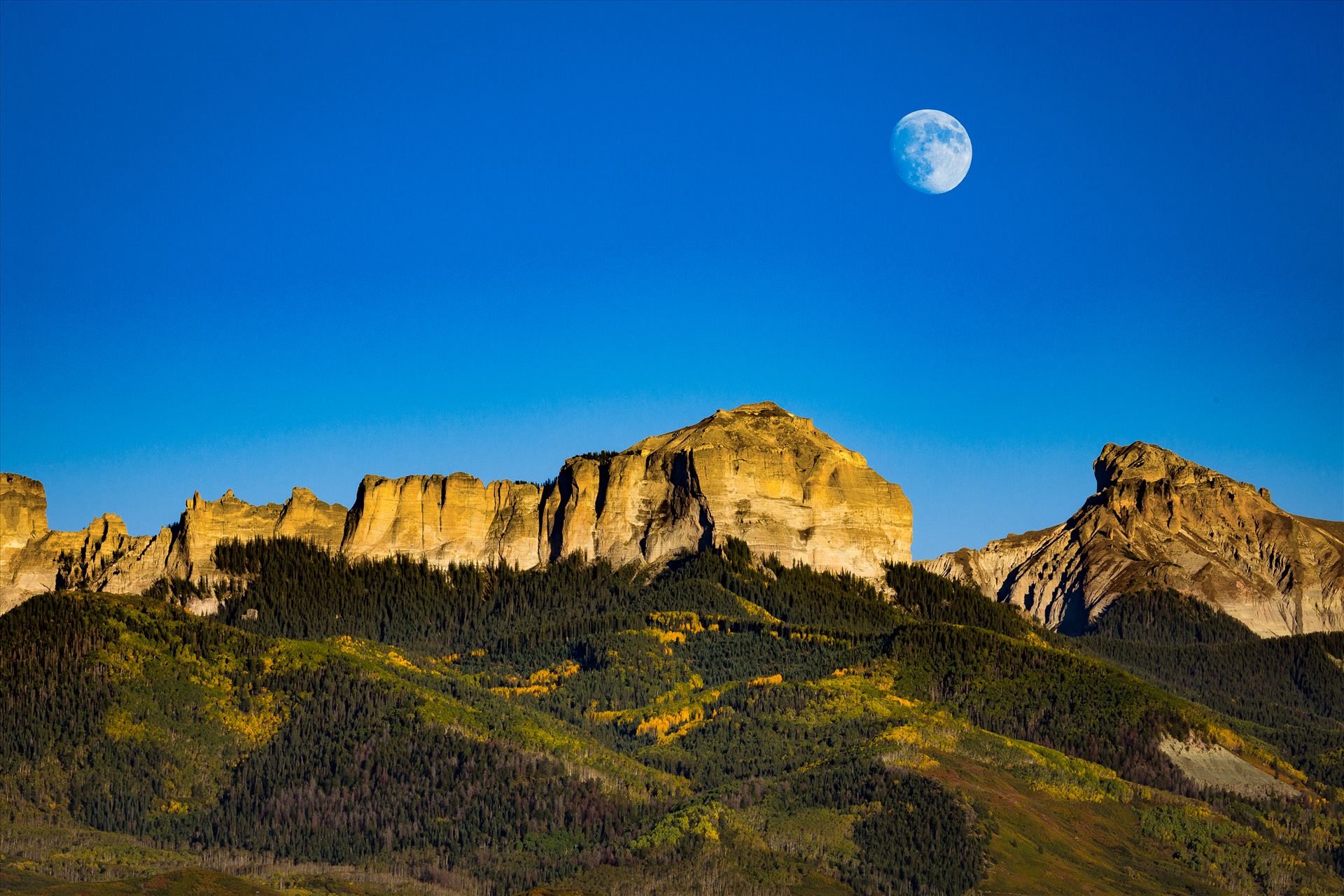 Moonrise over Chimney Peak The moon rises over Chimney Peak outside of Ridgeway, Colorado. by Scott Smith Photos