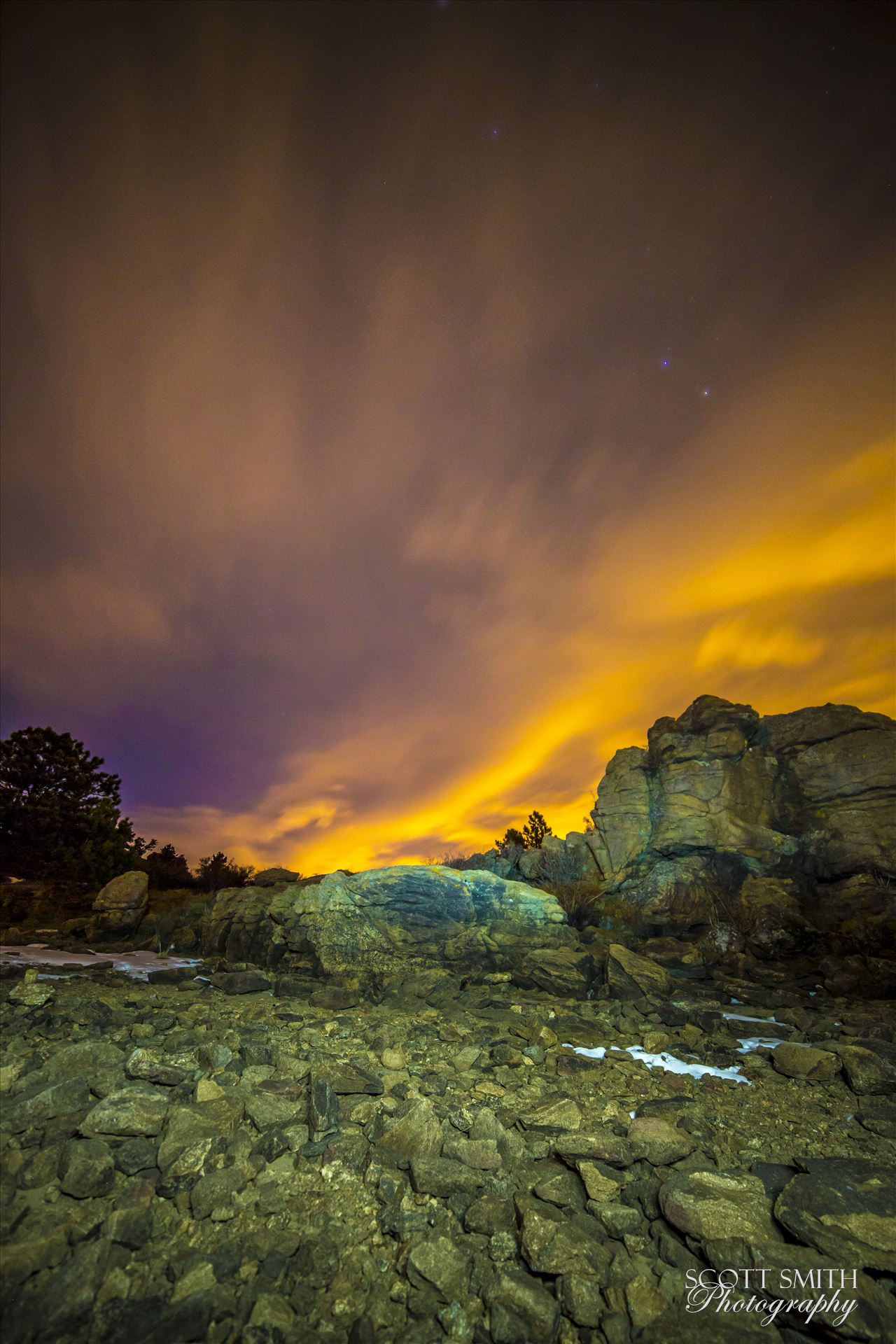 Night Sky on Fire at Mary's Lake Clouds lit from distant Boulder and Denver light the sky at midnight.  From the shore of Mary's Lake a few miles near Estes Park, looking east towards Denver. by Scott Smith Photos