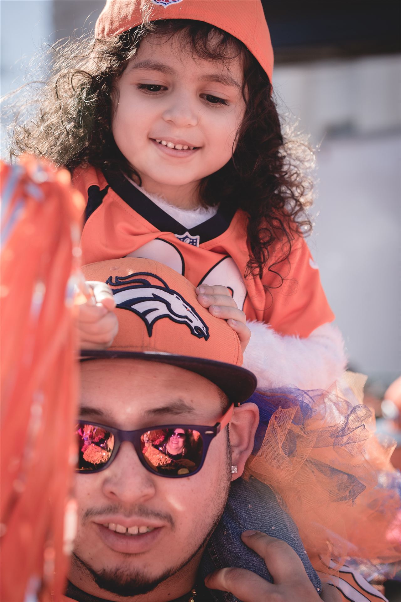Father Daughter Broncos Fans If you know who these two are... please contact me! I'd love to pass their photo long to them. by Scott Smith Photos
