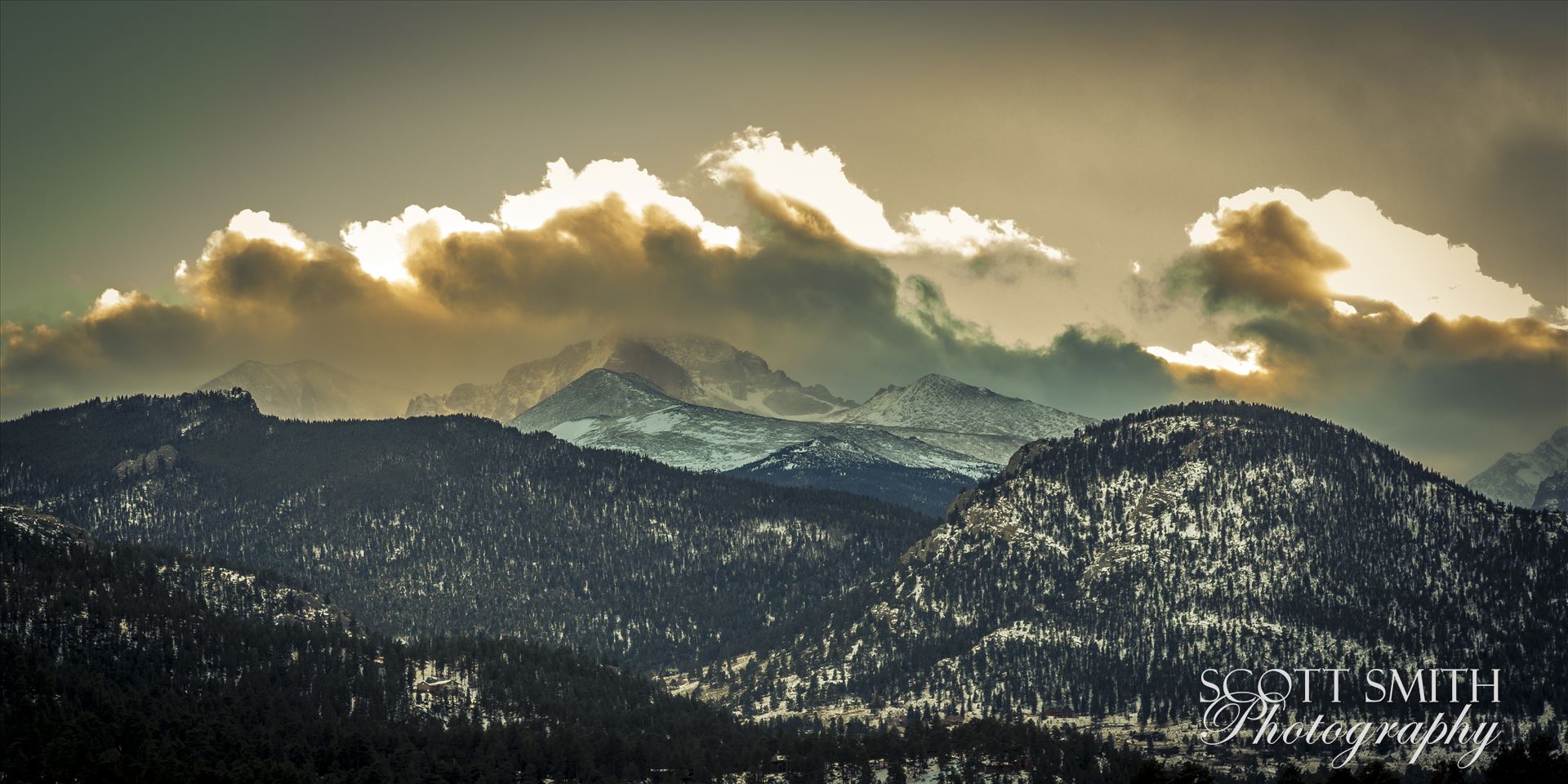Sunset from Estes The sun sets over peaks in the Rocky Mountain National Park, as seen from near the famous Stanley Hotel in Estes Park. by Scott Smith Photos