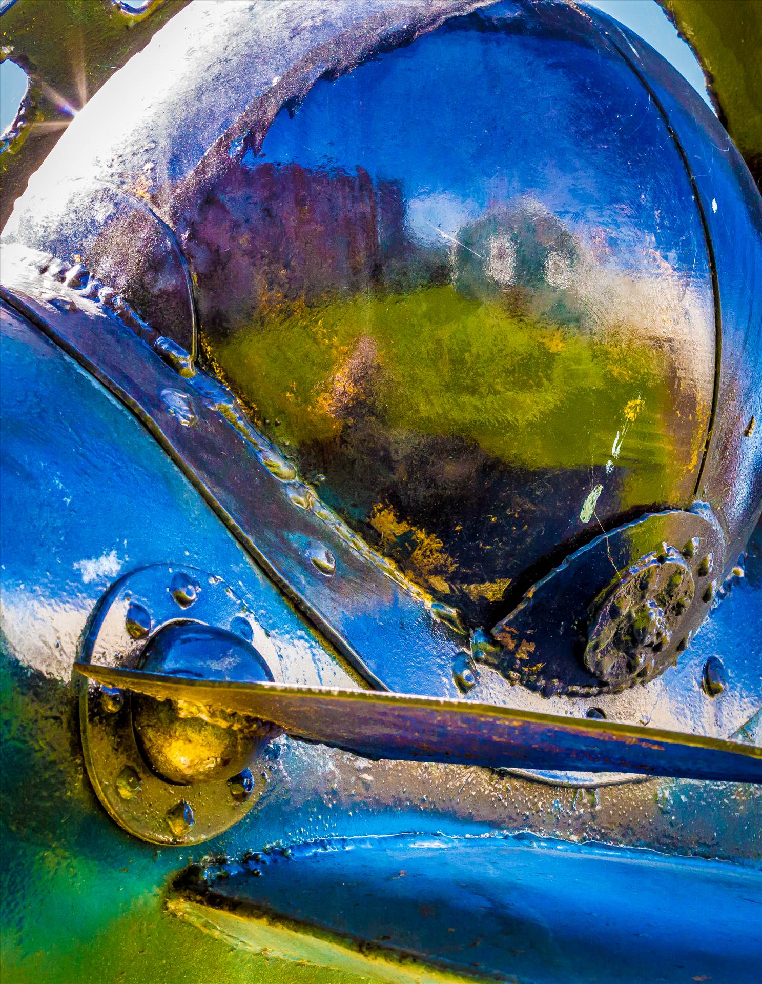 Shimmer Close-up of an abstract sculputure in Langley, Washington. 'Star Chaser 2' by John Moritz. by Scott Smith Photos