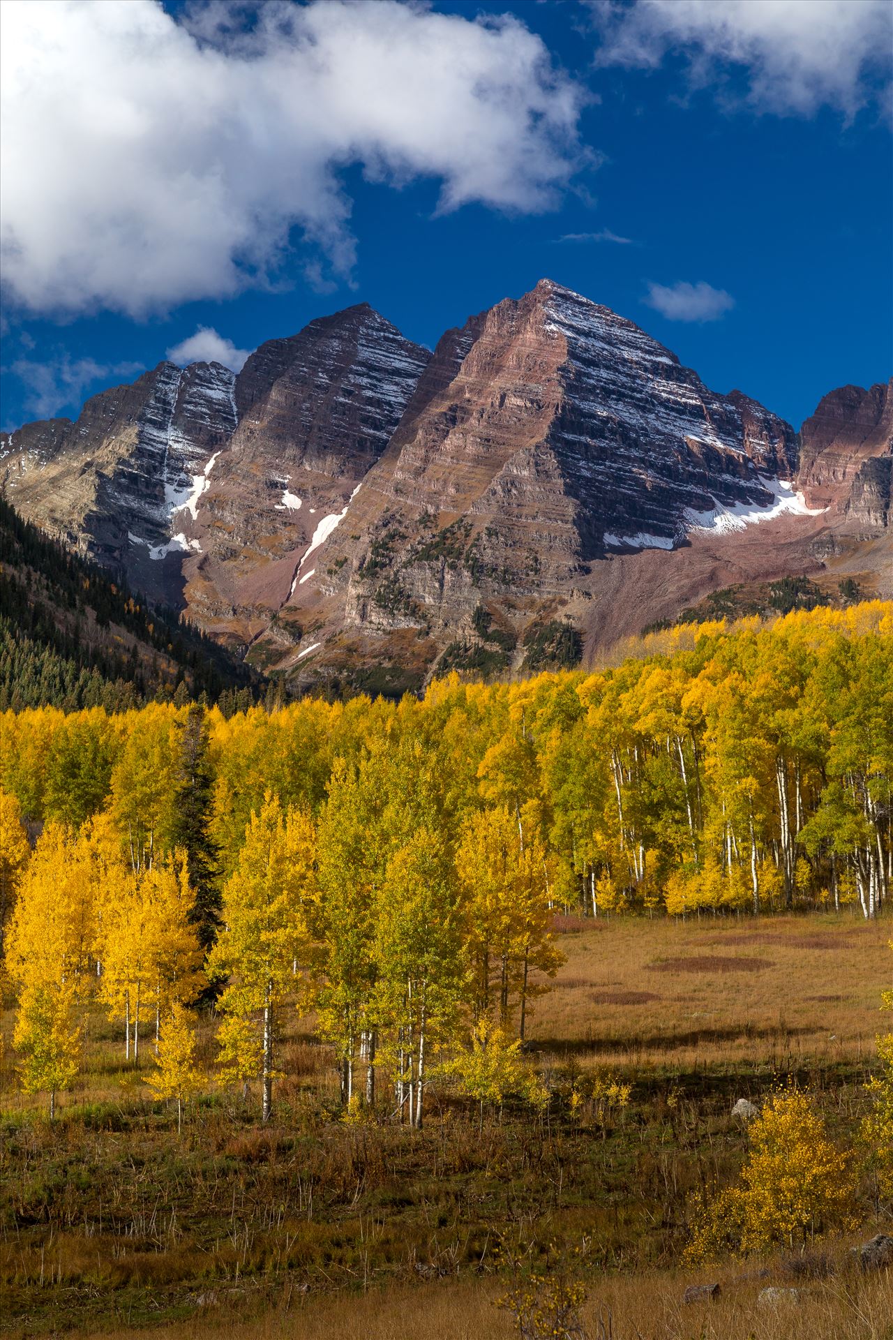 Maroon Bells from a Distance The Maroon Bells a few miles from the lake framed by beautiful fall aspens. by Scott Smith Photos